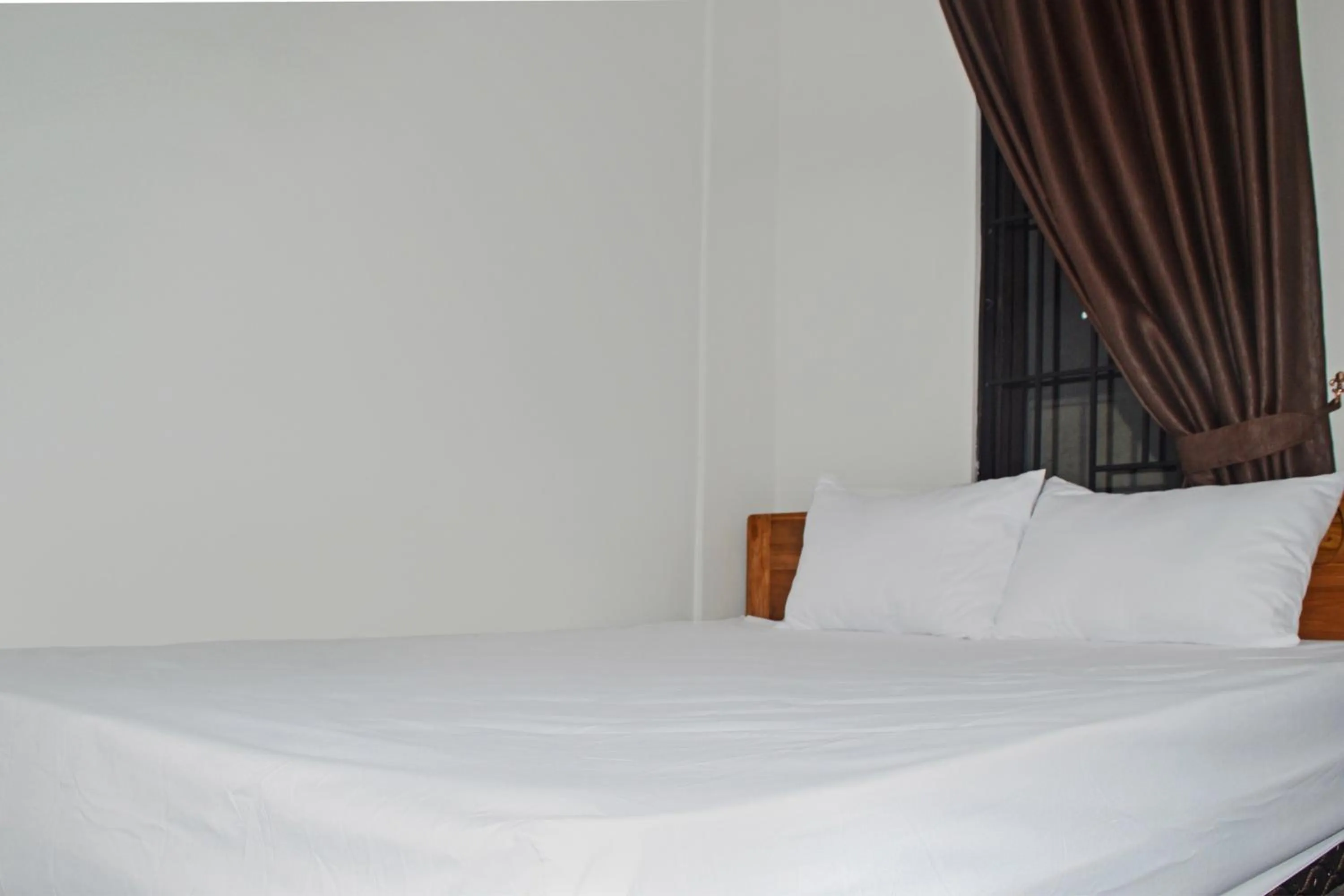 Bedroom in Super OYO 93085 Homy Stay Syariah