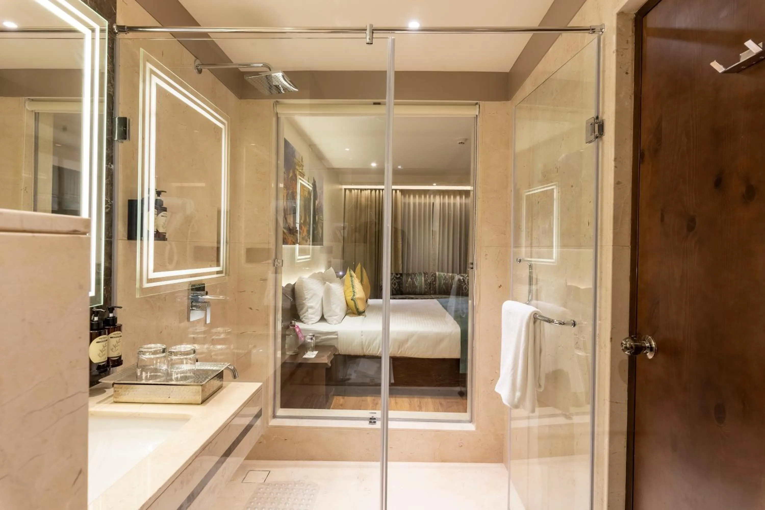 Bathroom, Bed in Regenta Central Javaji Mysore