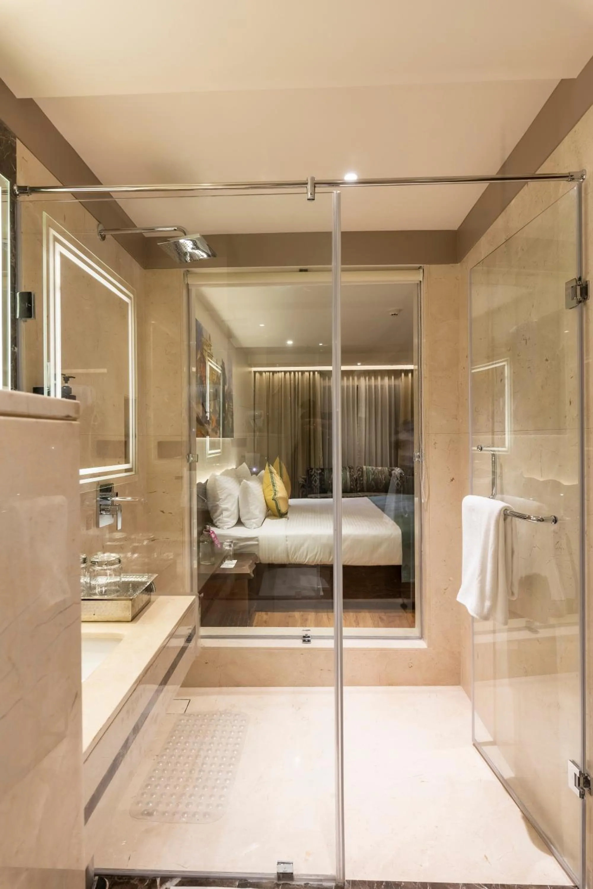 Bathroom, Bed in Regenta Central Javaji Mysore