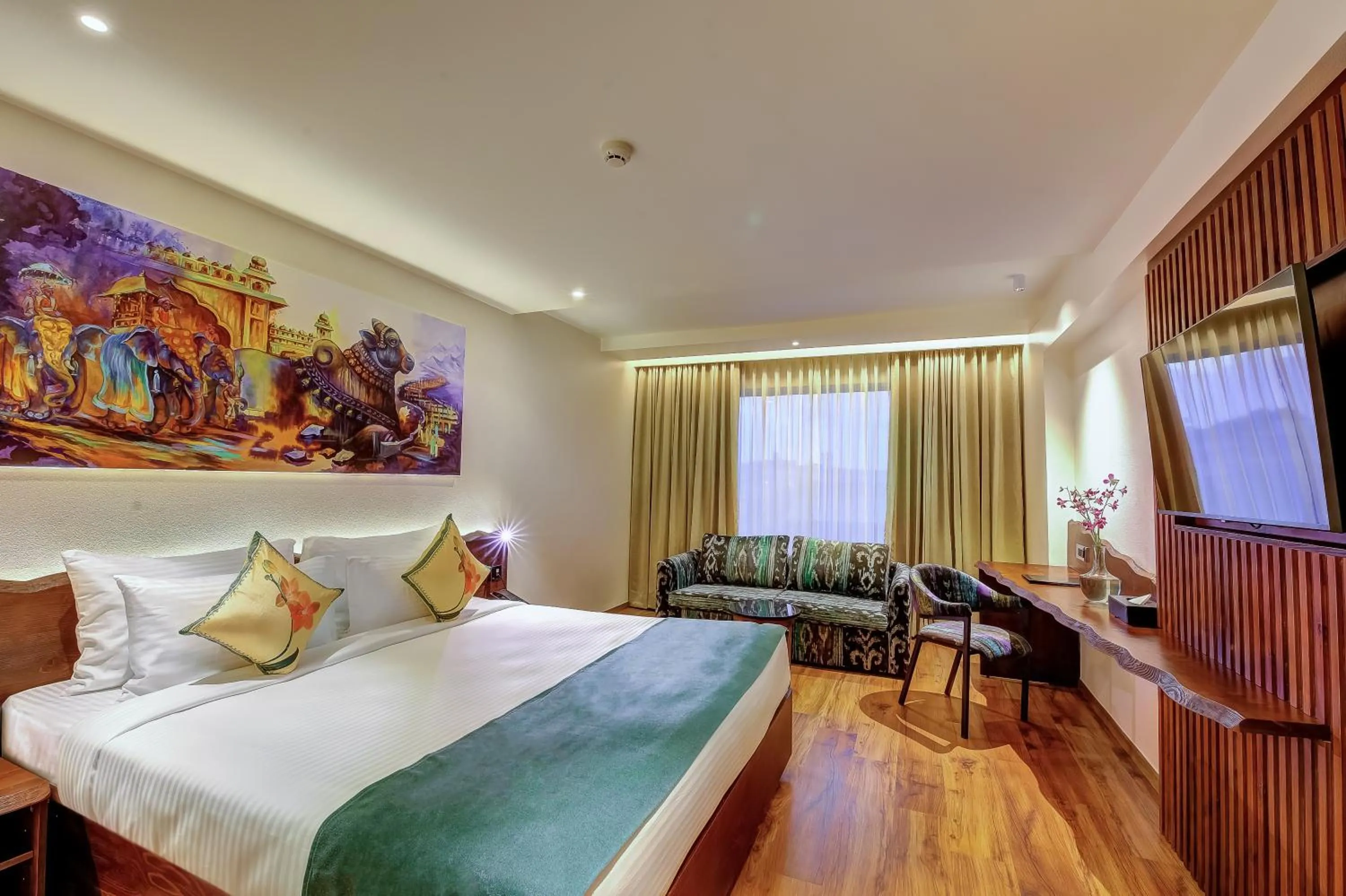 Bed in Regenta Central Javaji Mysore