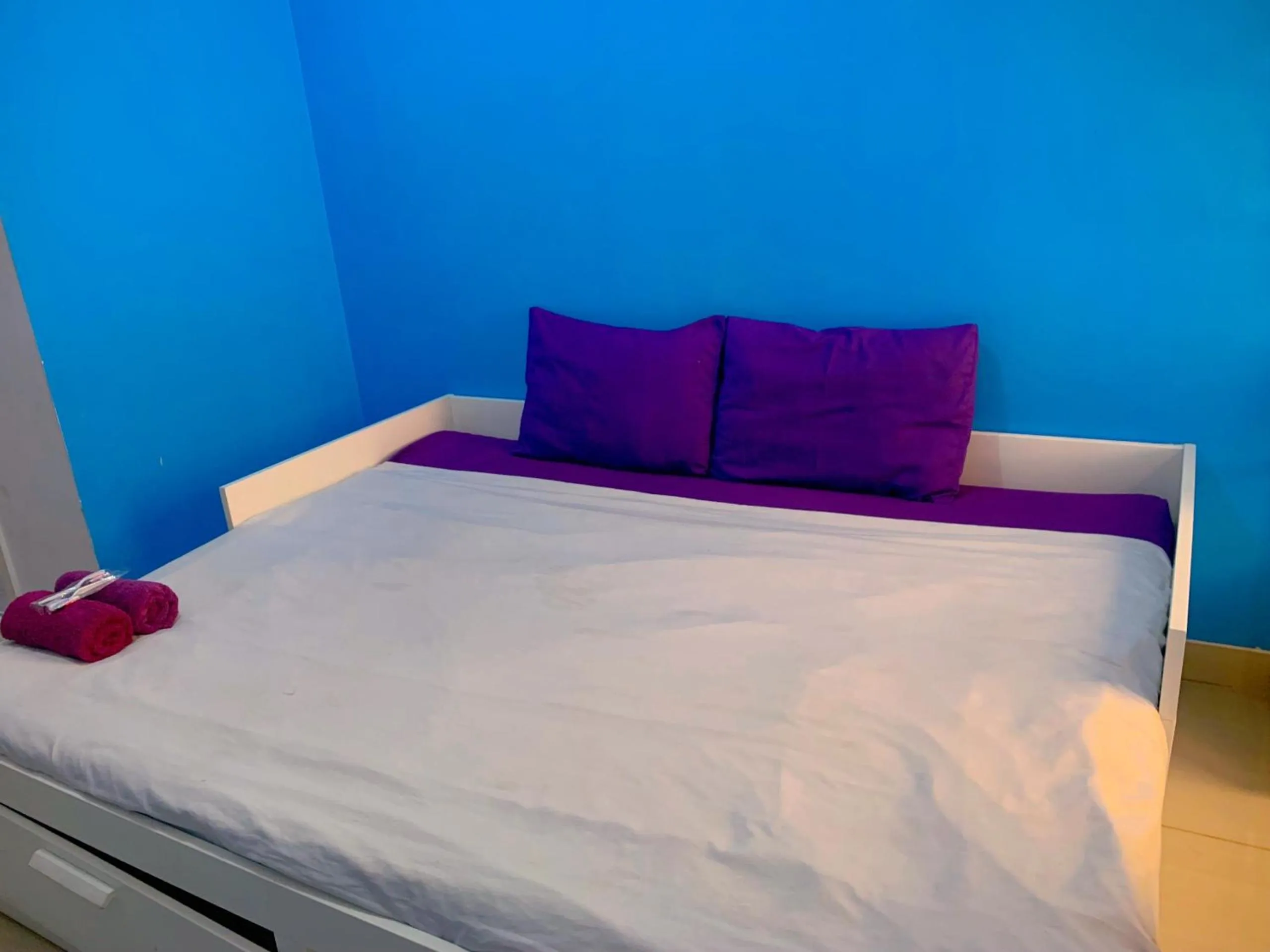 Bed in Apartemen Poris 88 by Benchmark