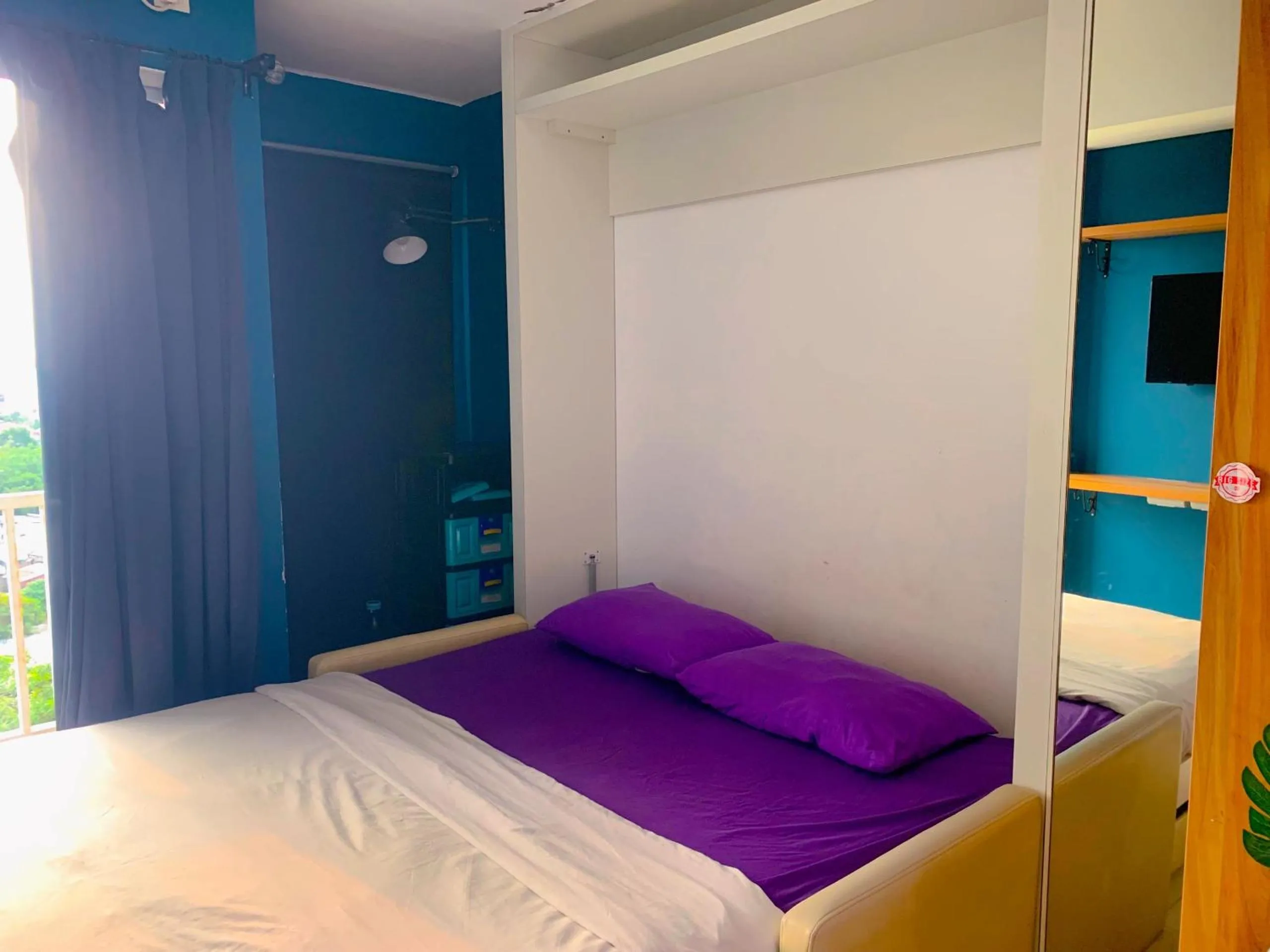 Bedroom in Apartemen Poris 88 by Benchmark