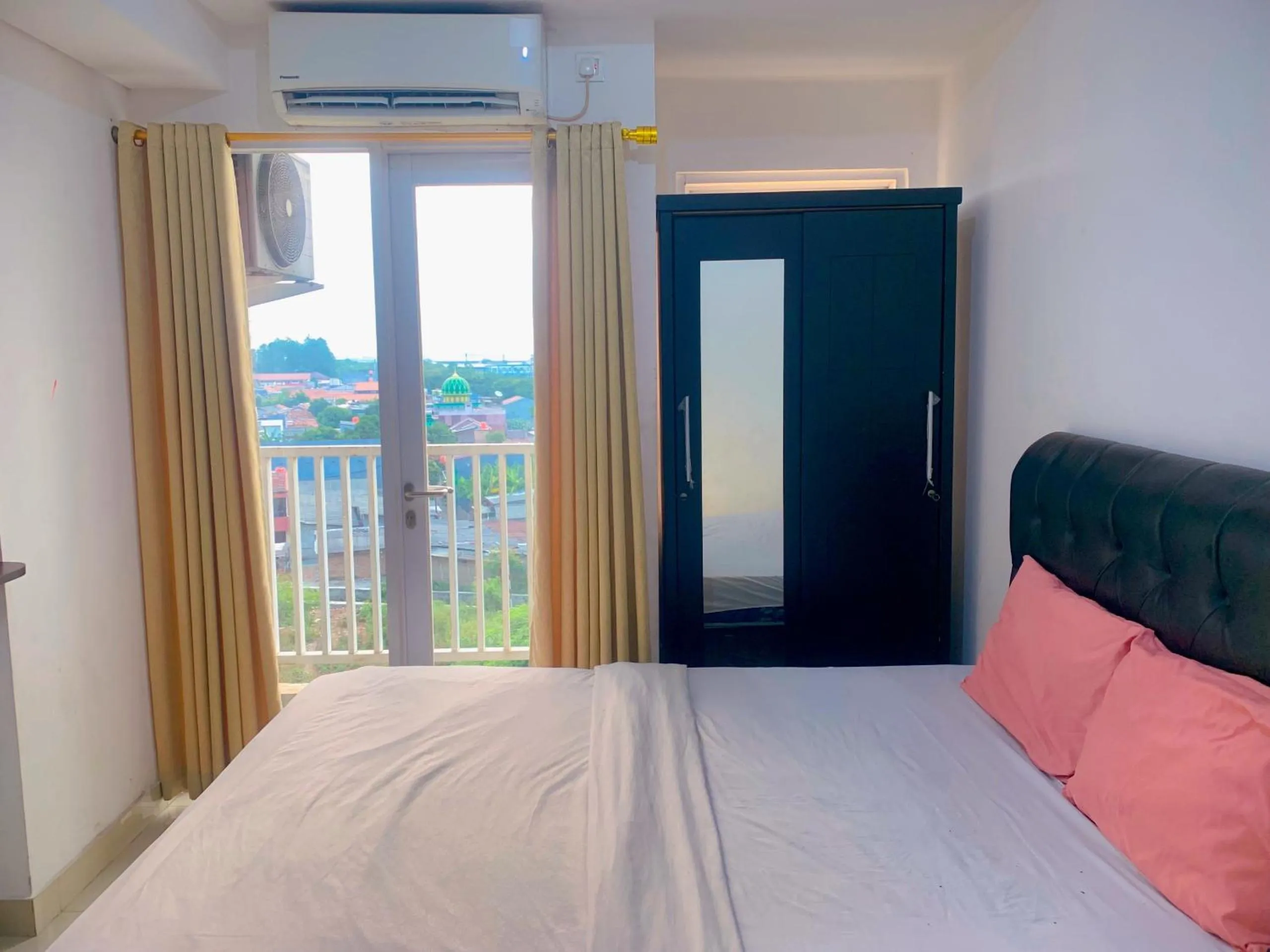 Bed in Apartemen Poris 88 by Benchmark