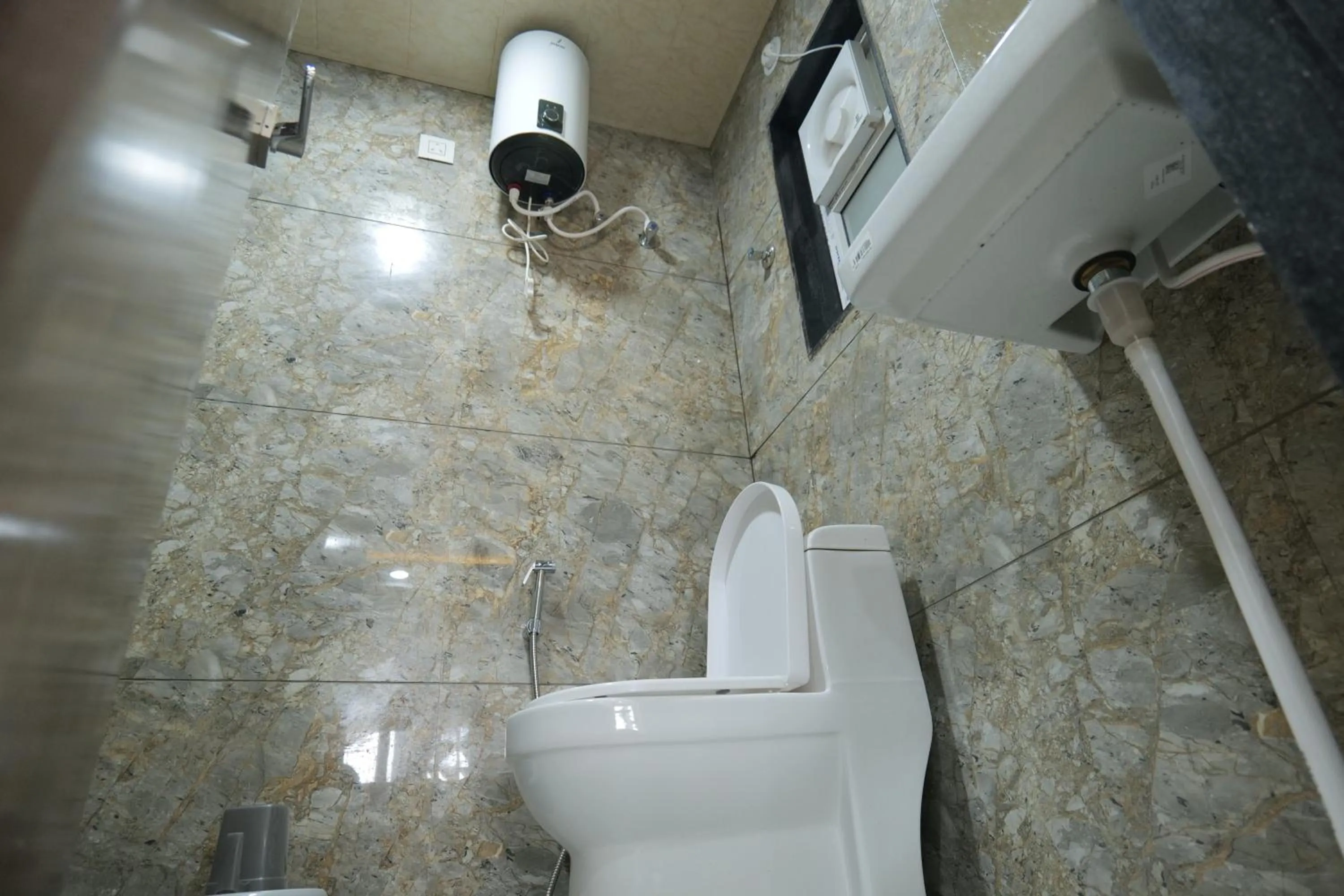 Shower, Bathroom in Hotel Adhiraj Inn