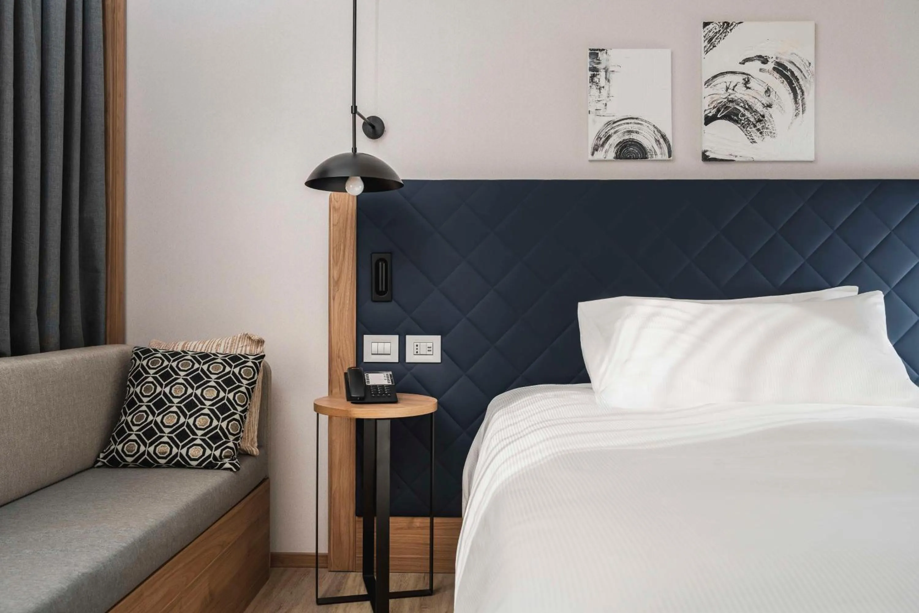 Living room, Bed in Hilton Garden Inn Padova City Centre