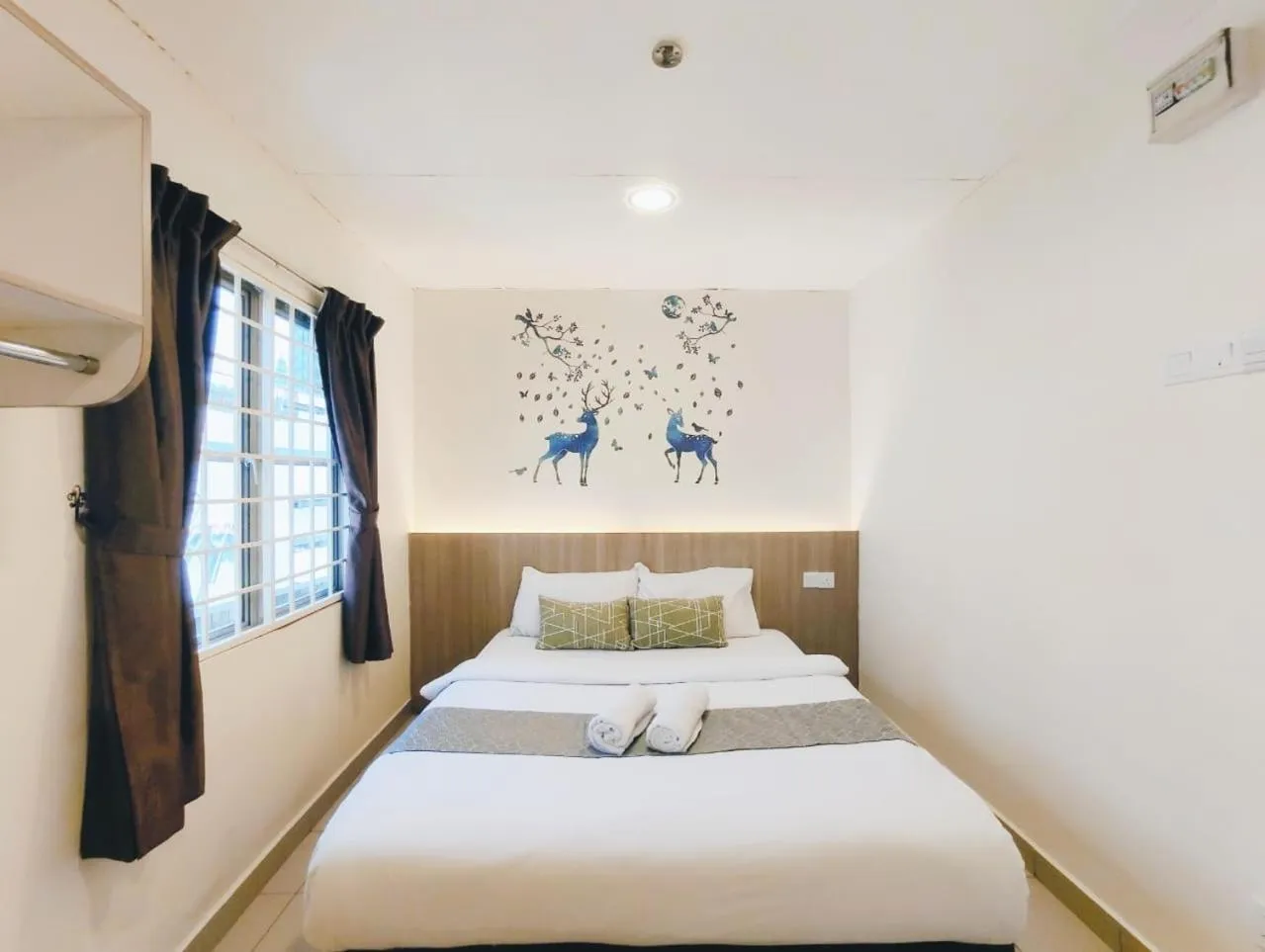 Bed in SCC Gateway Chinatown Hotel