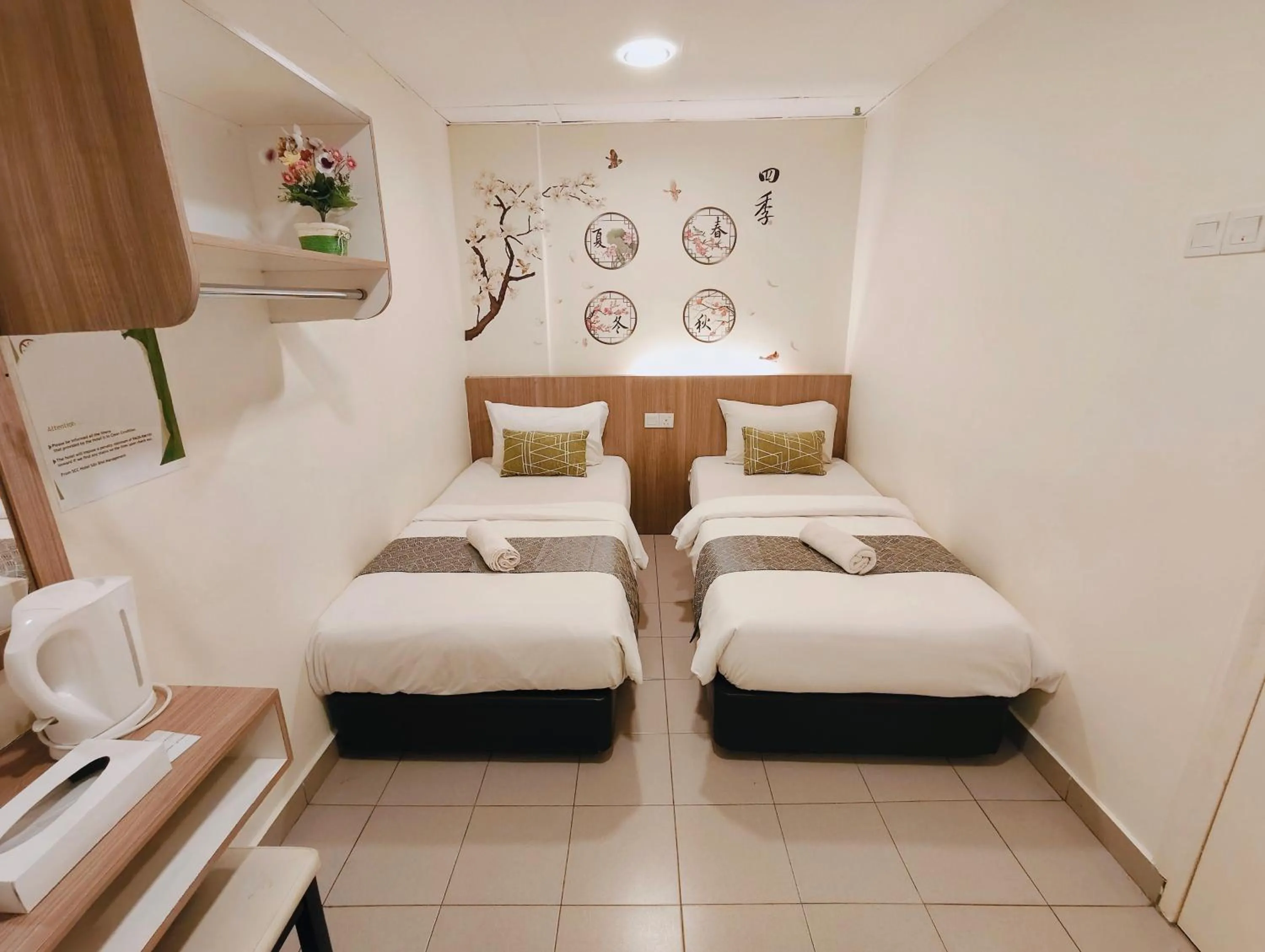 Bed in SCC Gateway Chinatown Hotel