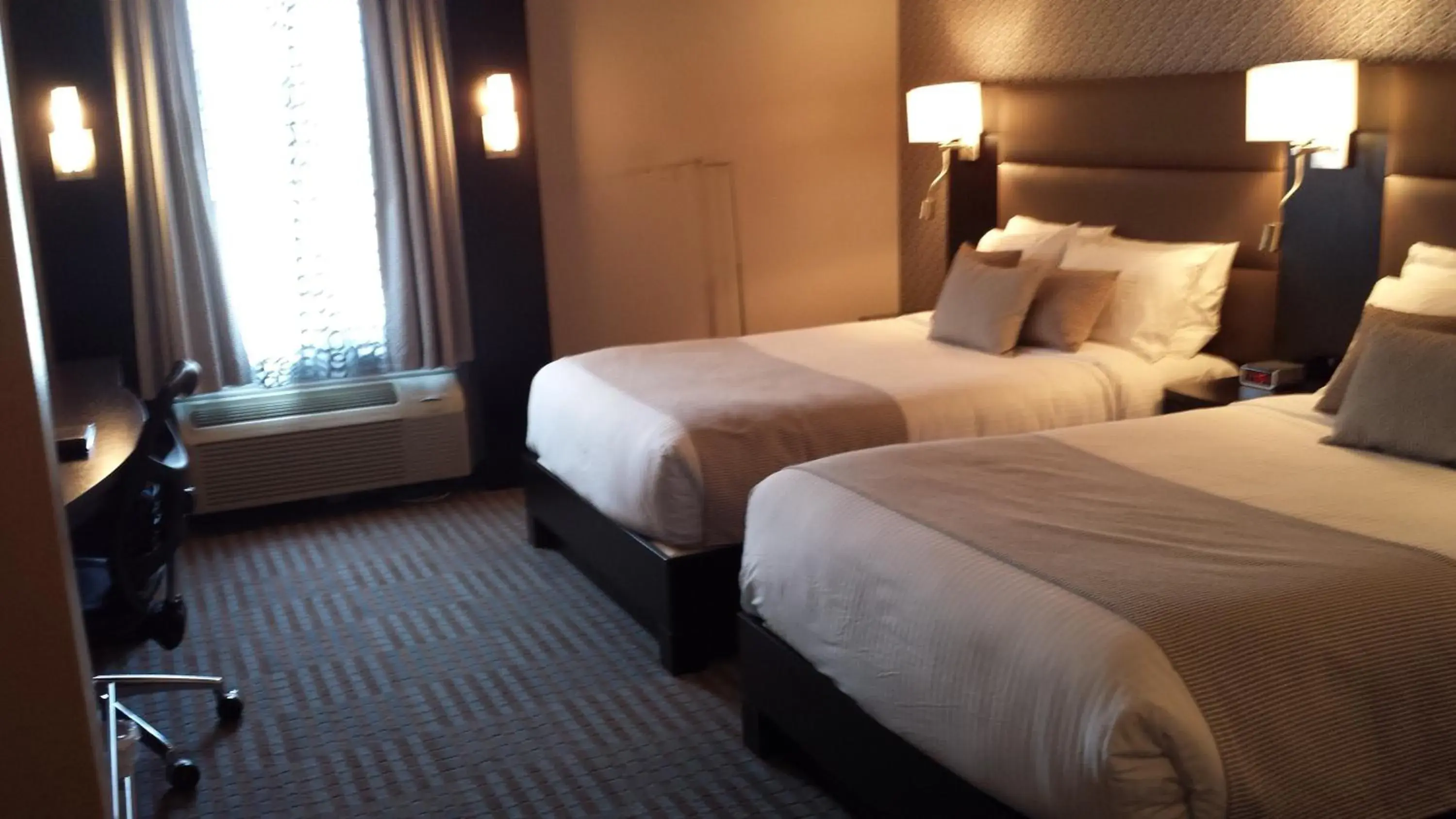 Double Room with Two Double Beds in Hôtel Nouvelle-Frontière Double Room with Two Double Beds in Hôtel Nouvelle-Frontière