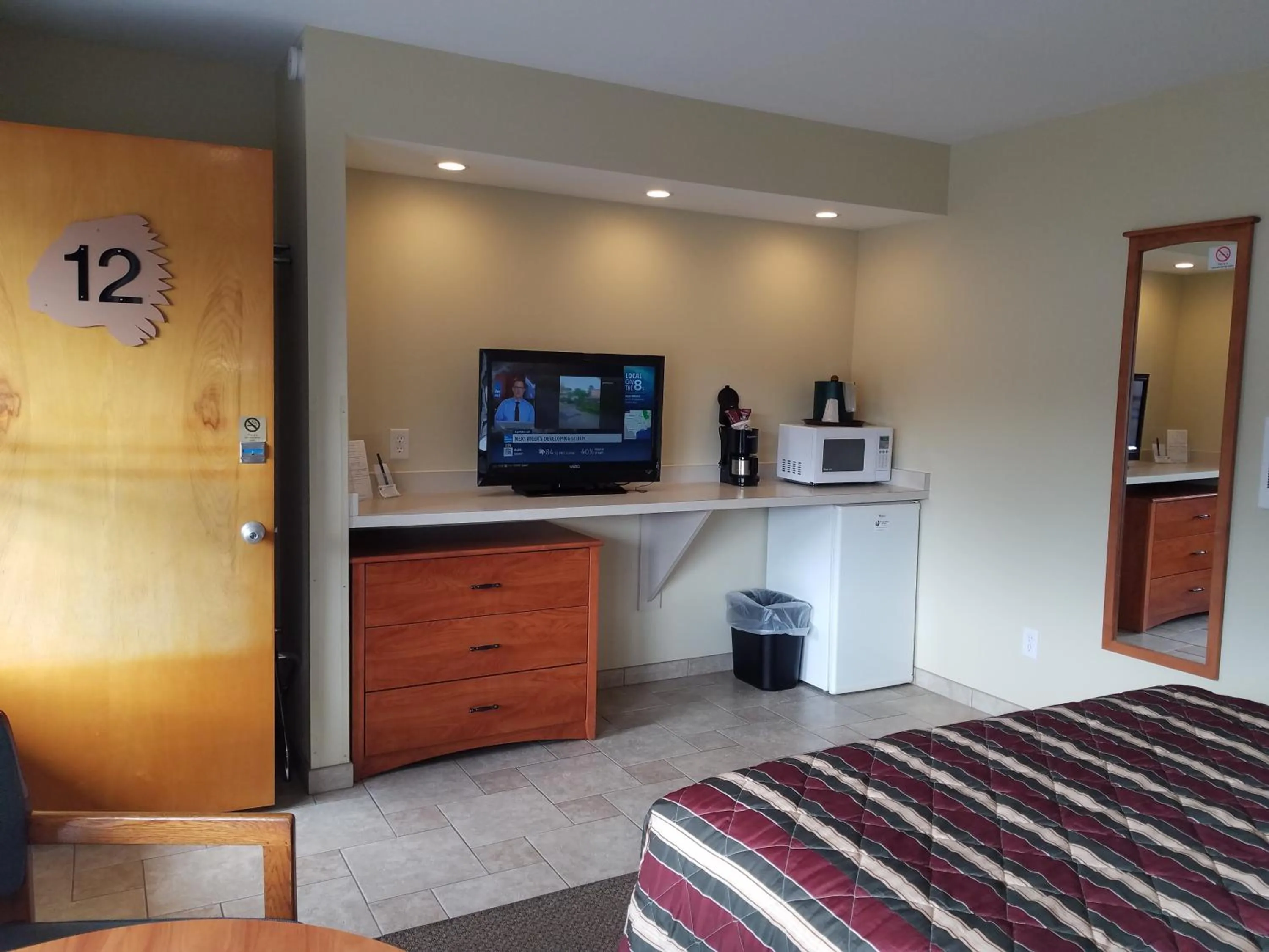 Bed in Black Hawk Motel & Suites