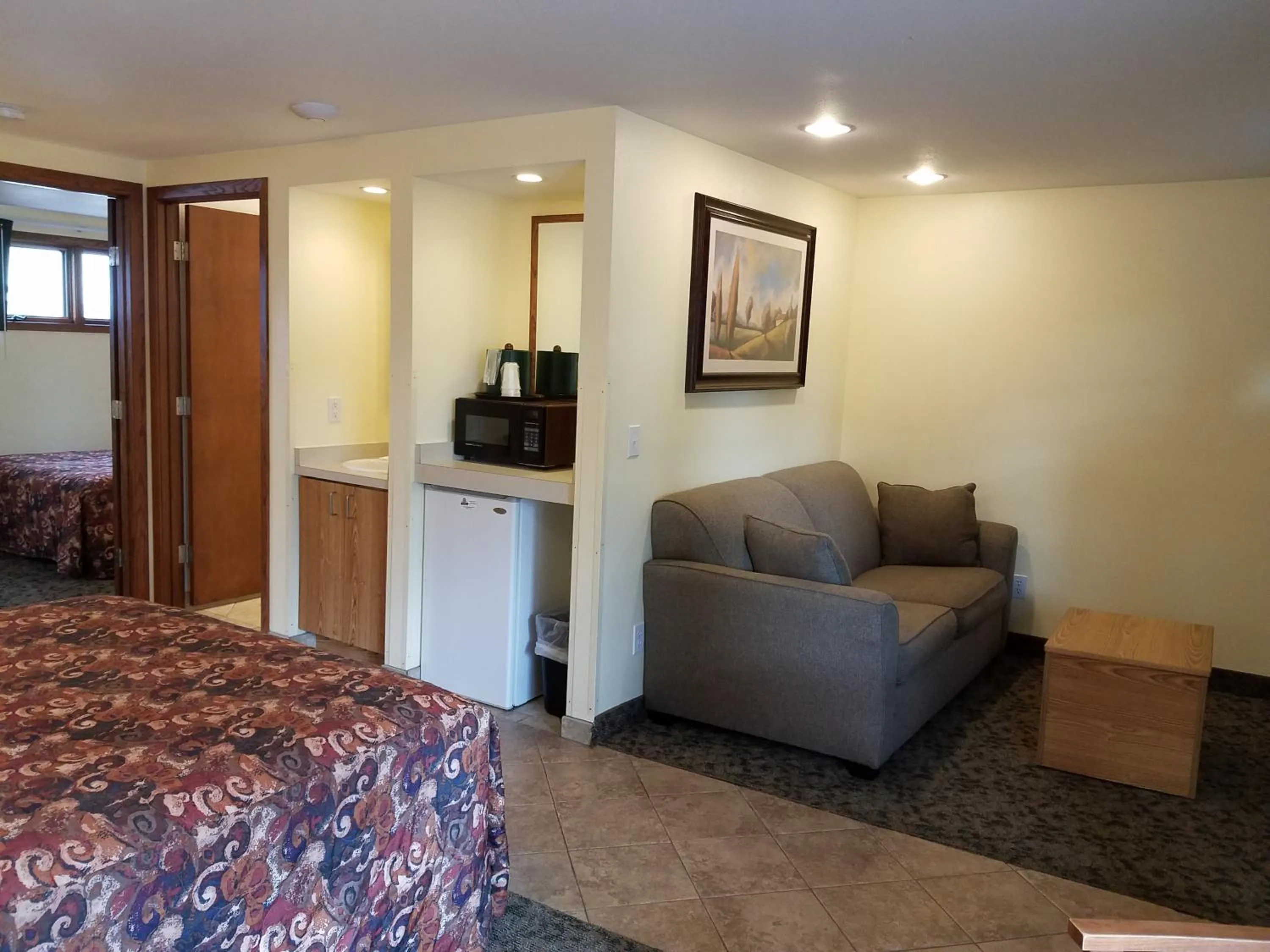 Bed in Black Hawk Motel & Suites