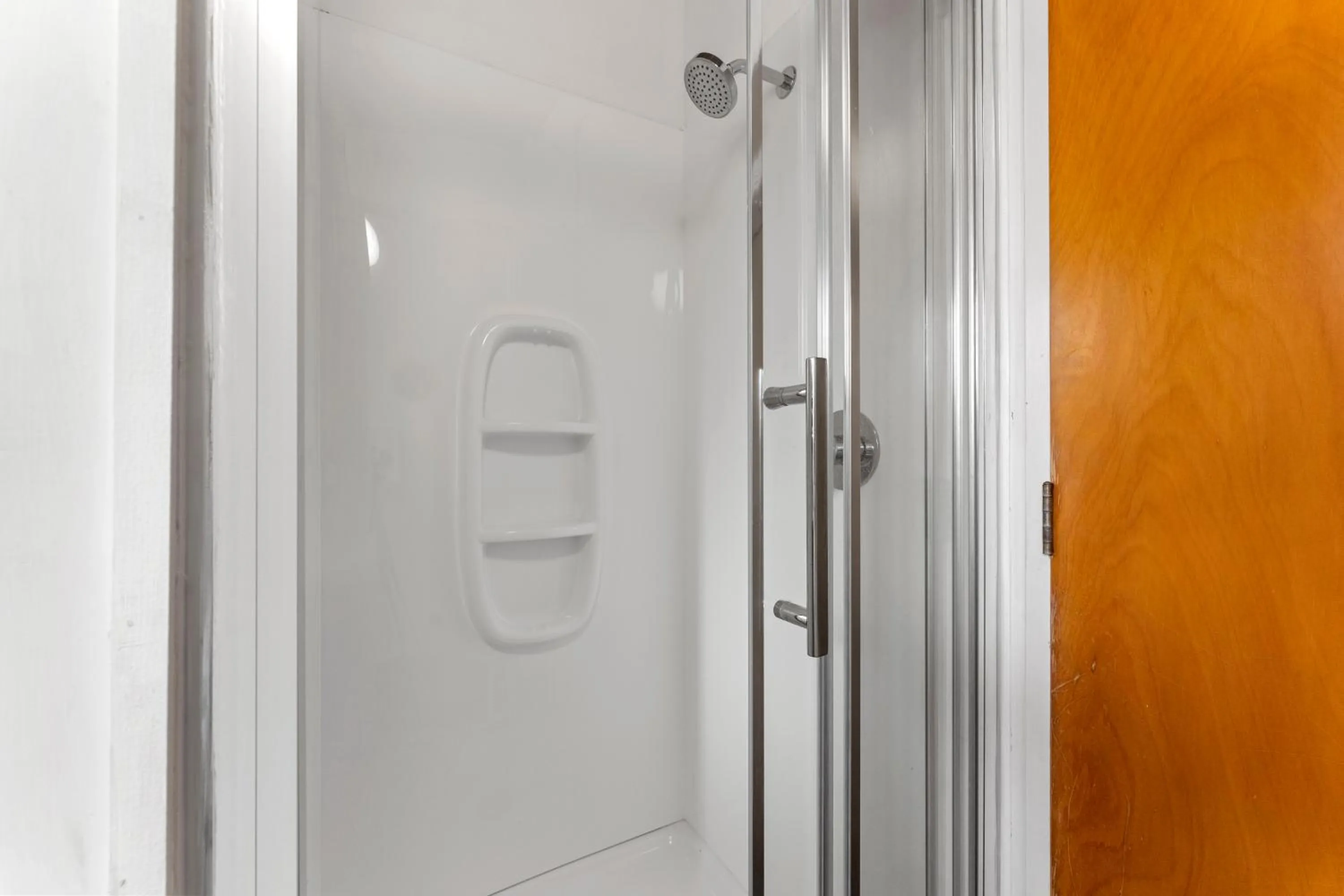 Shower in Coachman's Lodge Motel