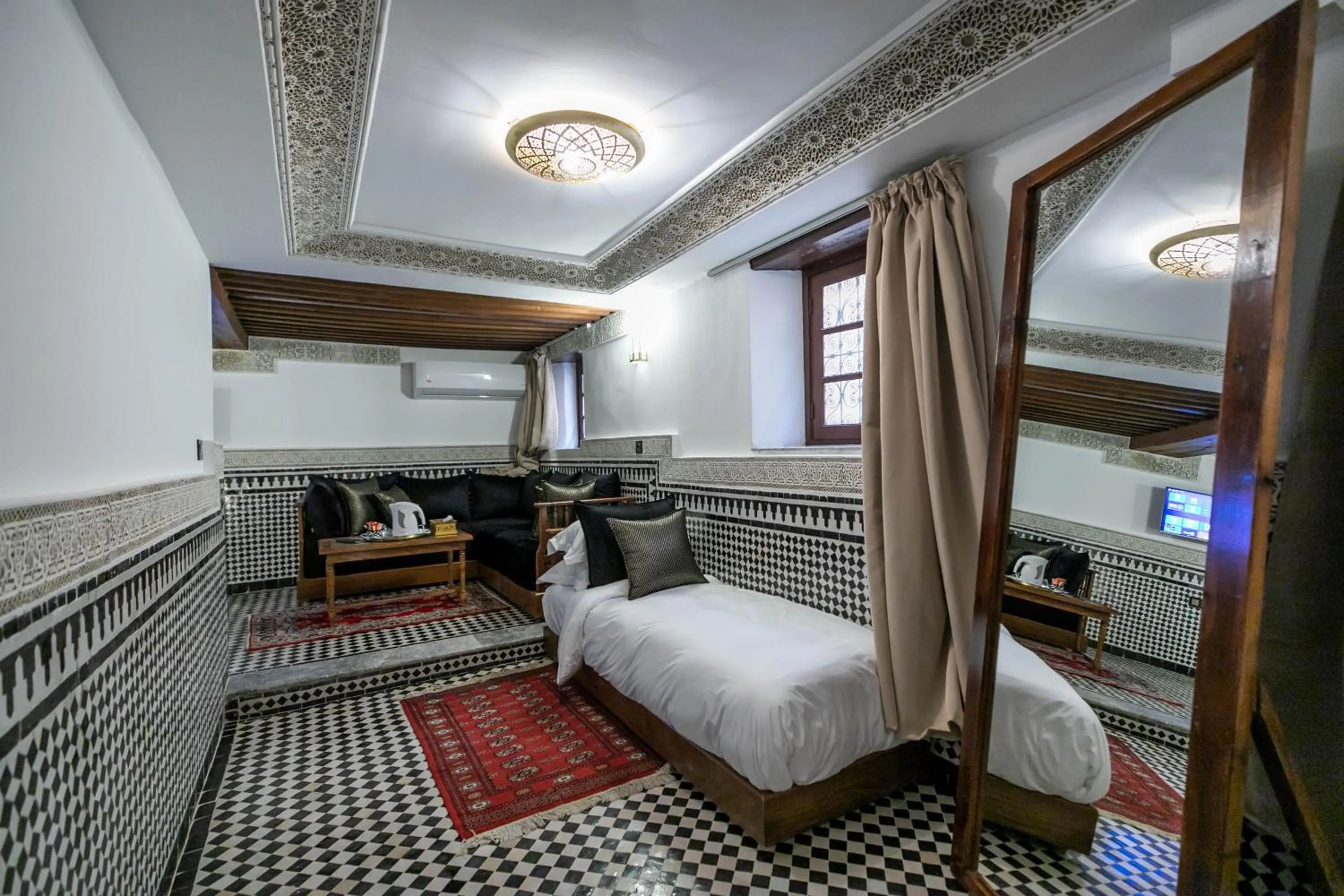 Bed in Riad Fes Ziyat & Spa