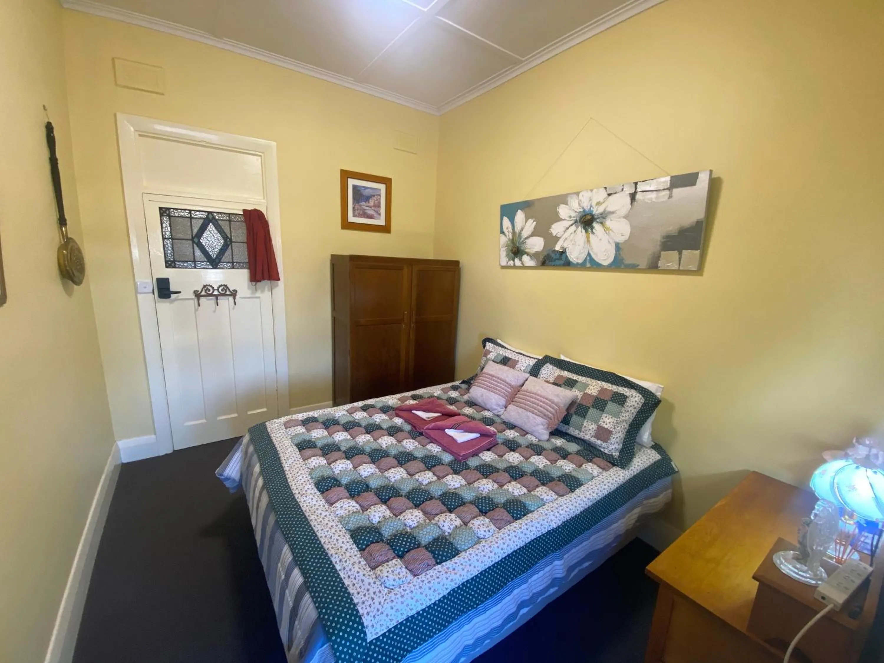Photo of the whole room, Bed in COMMERCIAL HOTEL KANIVA