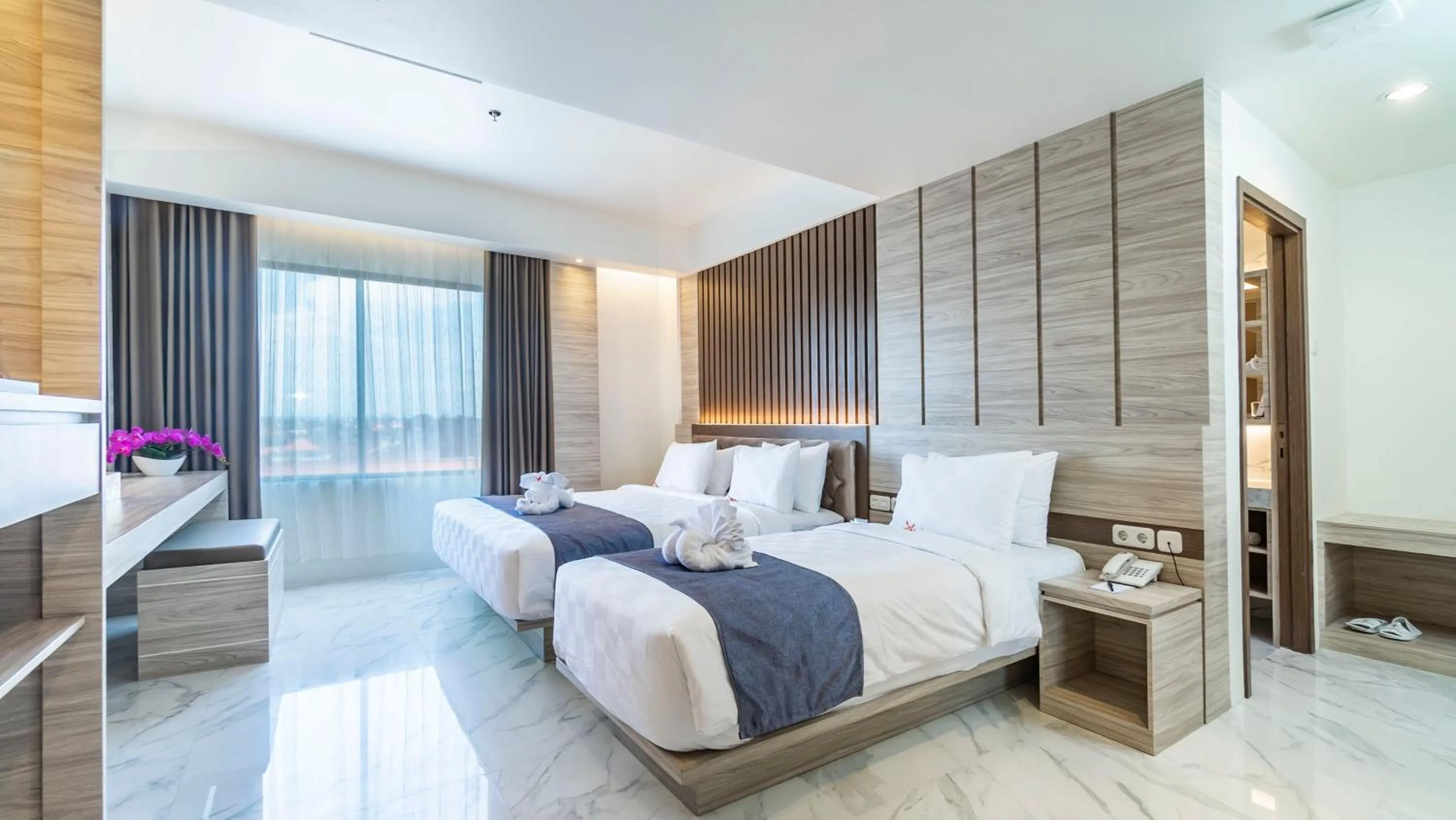 Bed in City of Aventus Hotel - Denpasar