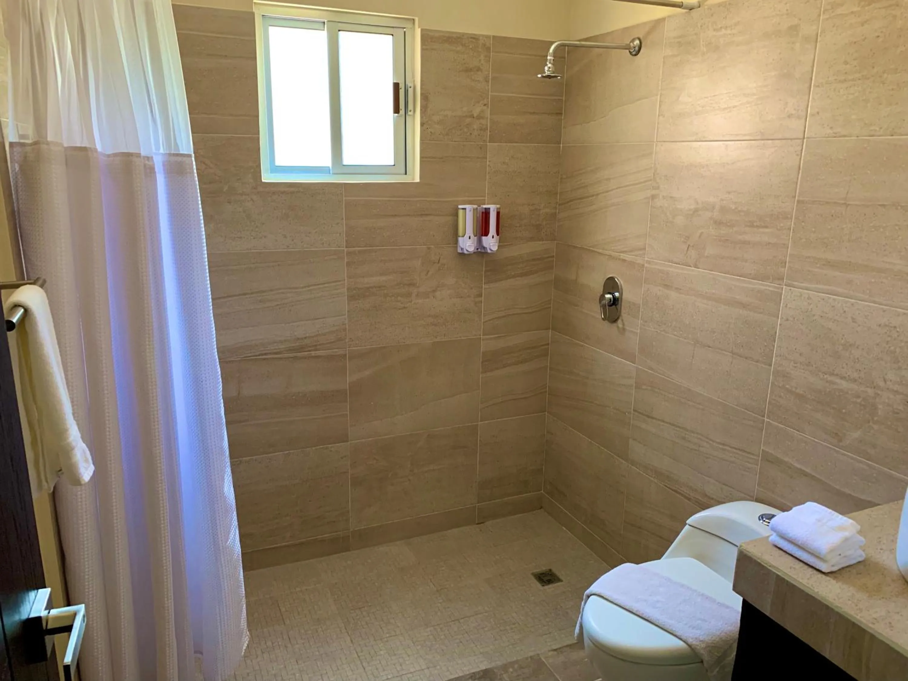 Shower in Ammare Hotel Boutique