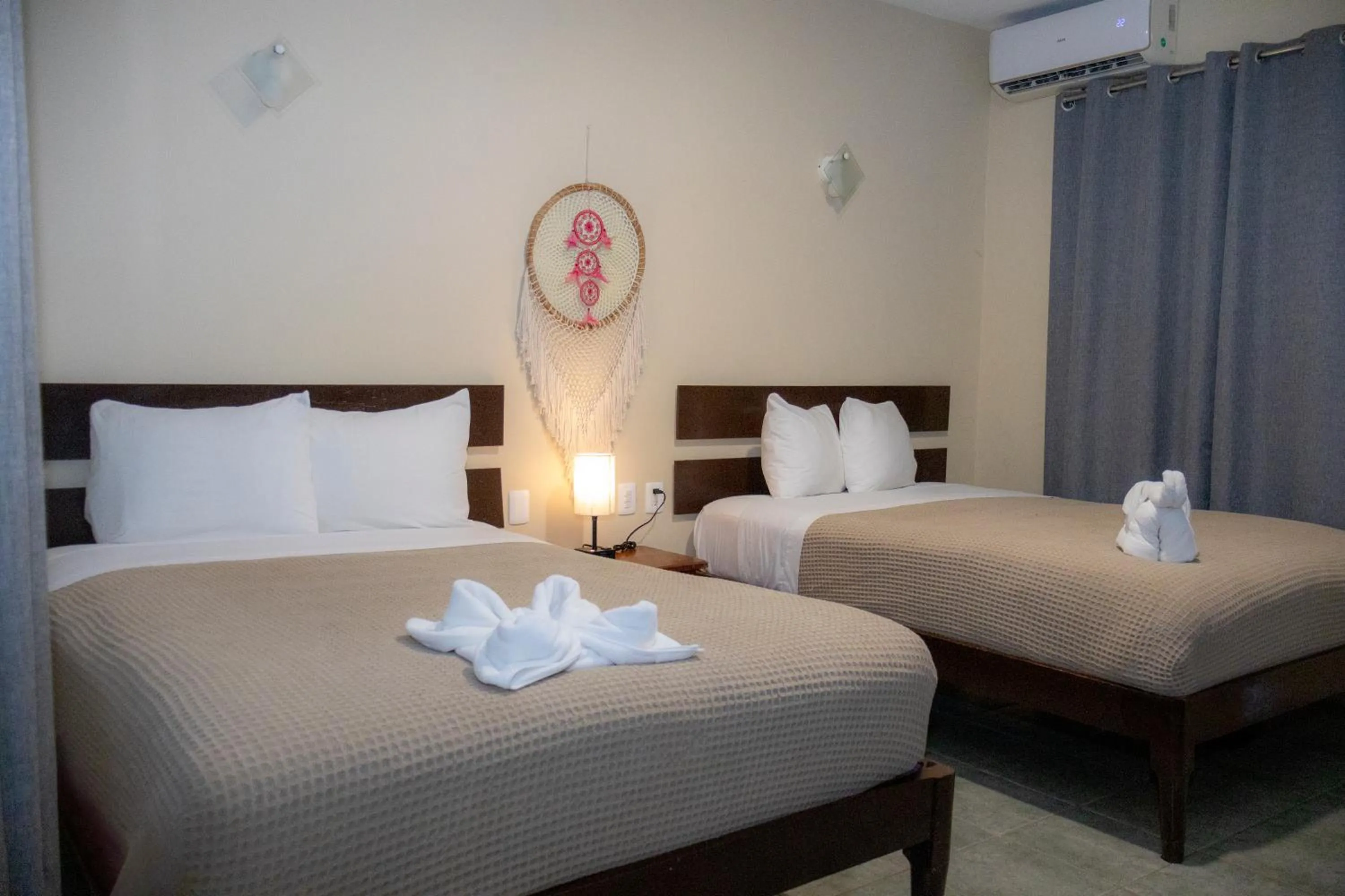 Bed in Ammare Hotel Boutique