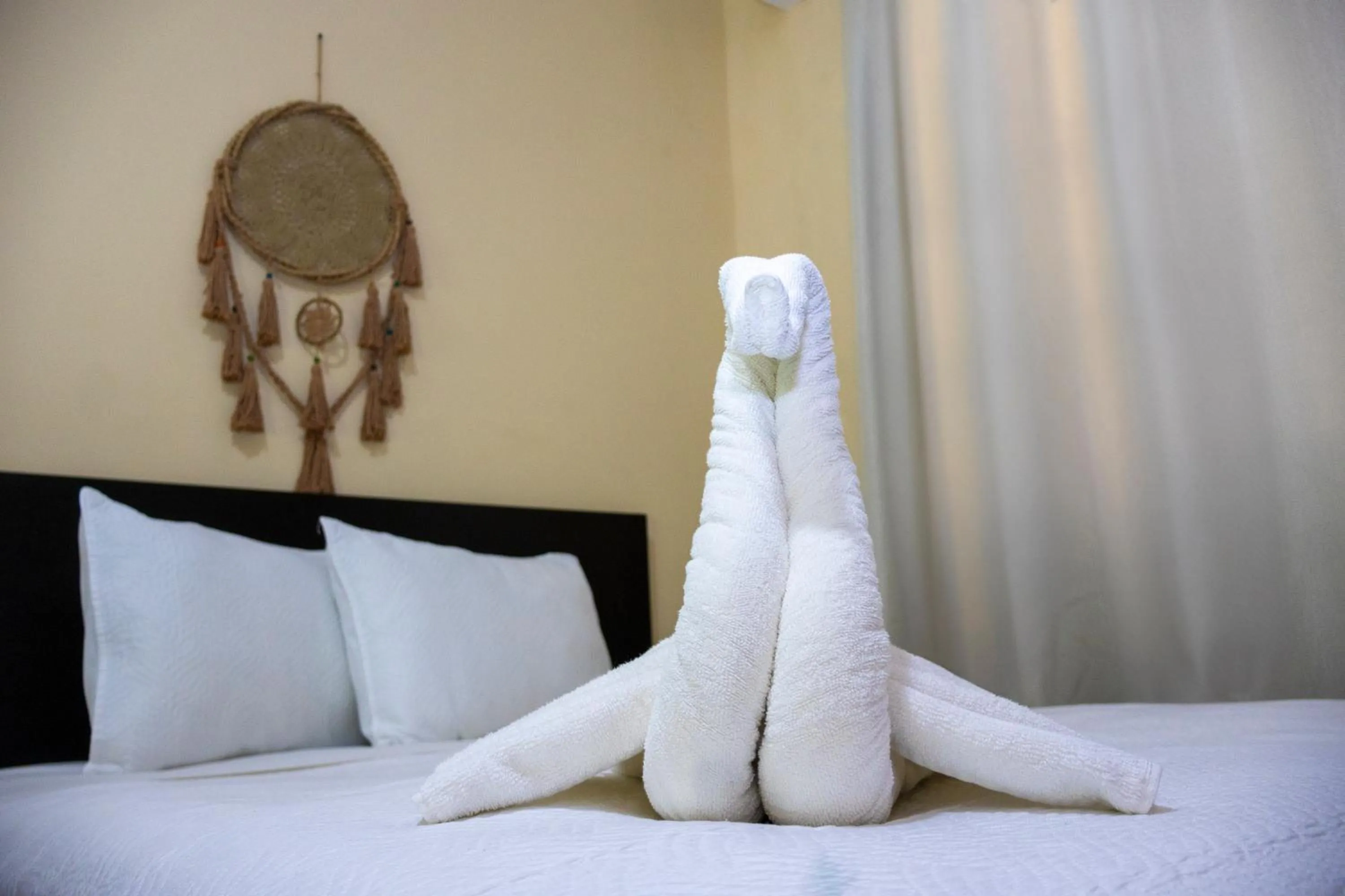 Bed in Ammare Hotel Boutique