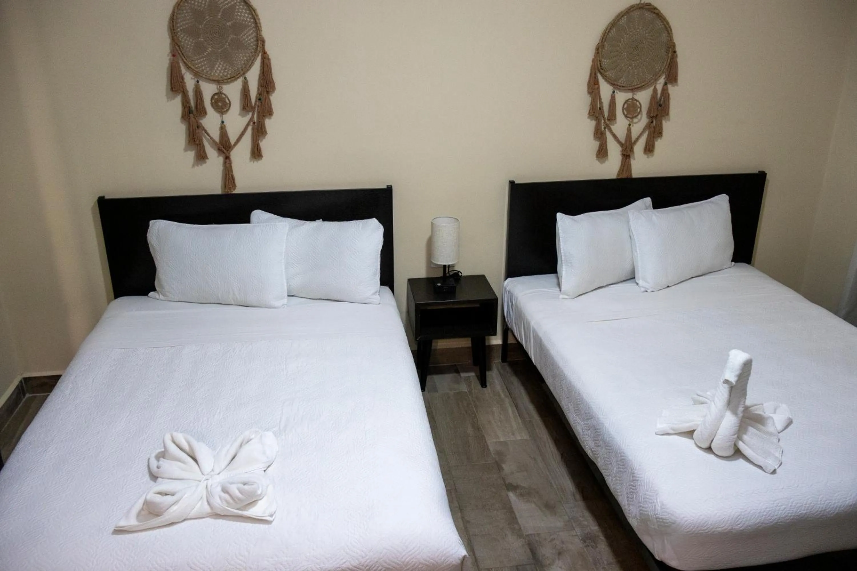 Bed in Ammare Hotel Boutique