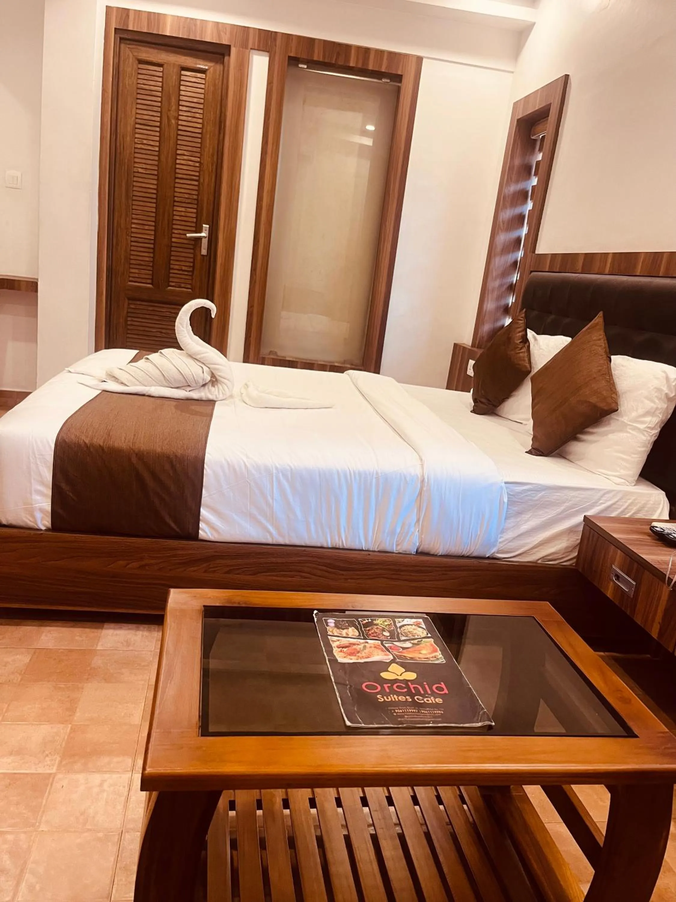 Bed in Hotel orchid suites Cochin