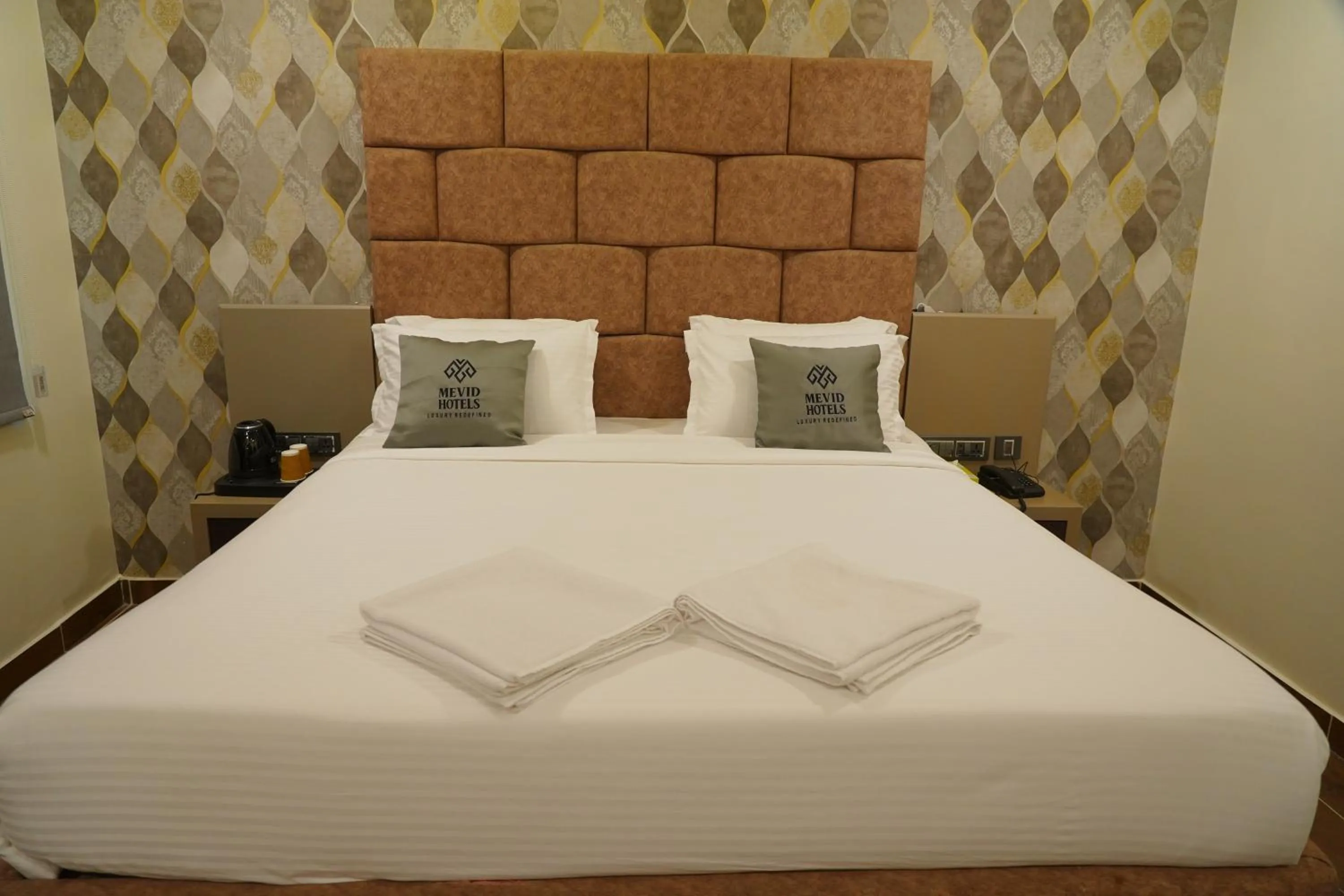 Bed in Mevid Hotels