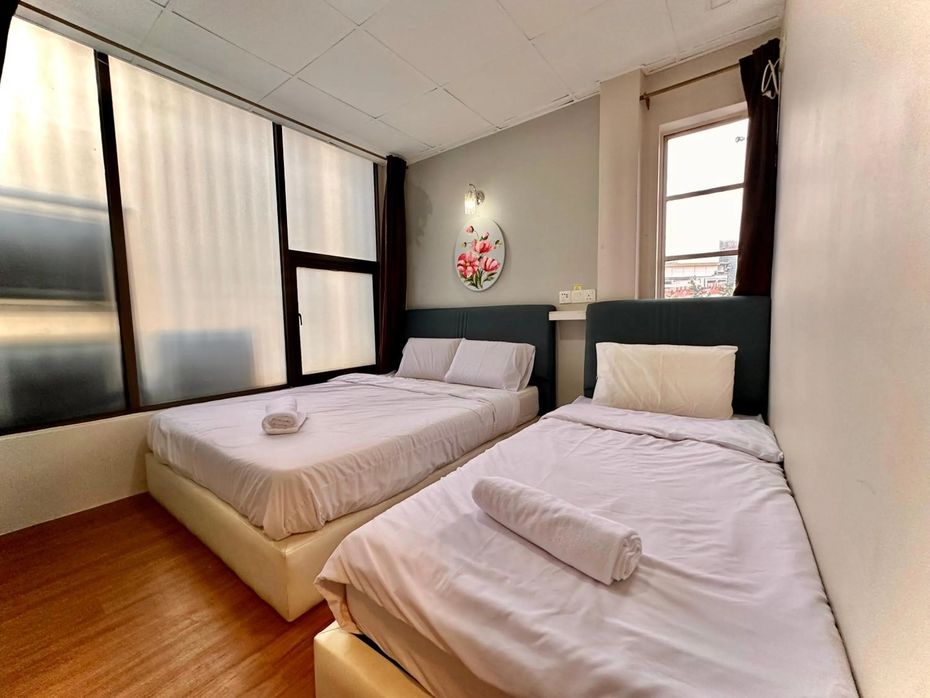 Bed in Dingdong Homes Hotel