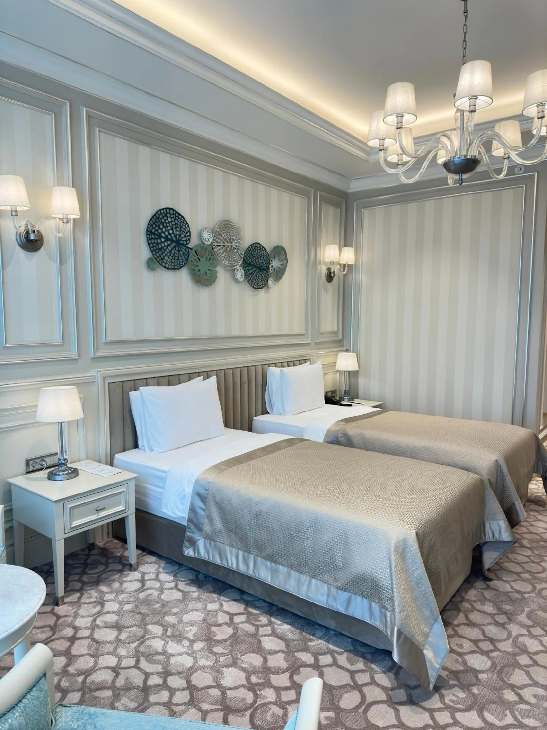 Bed in T-CITY PRESIDENTIAL HOTEL