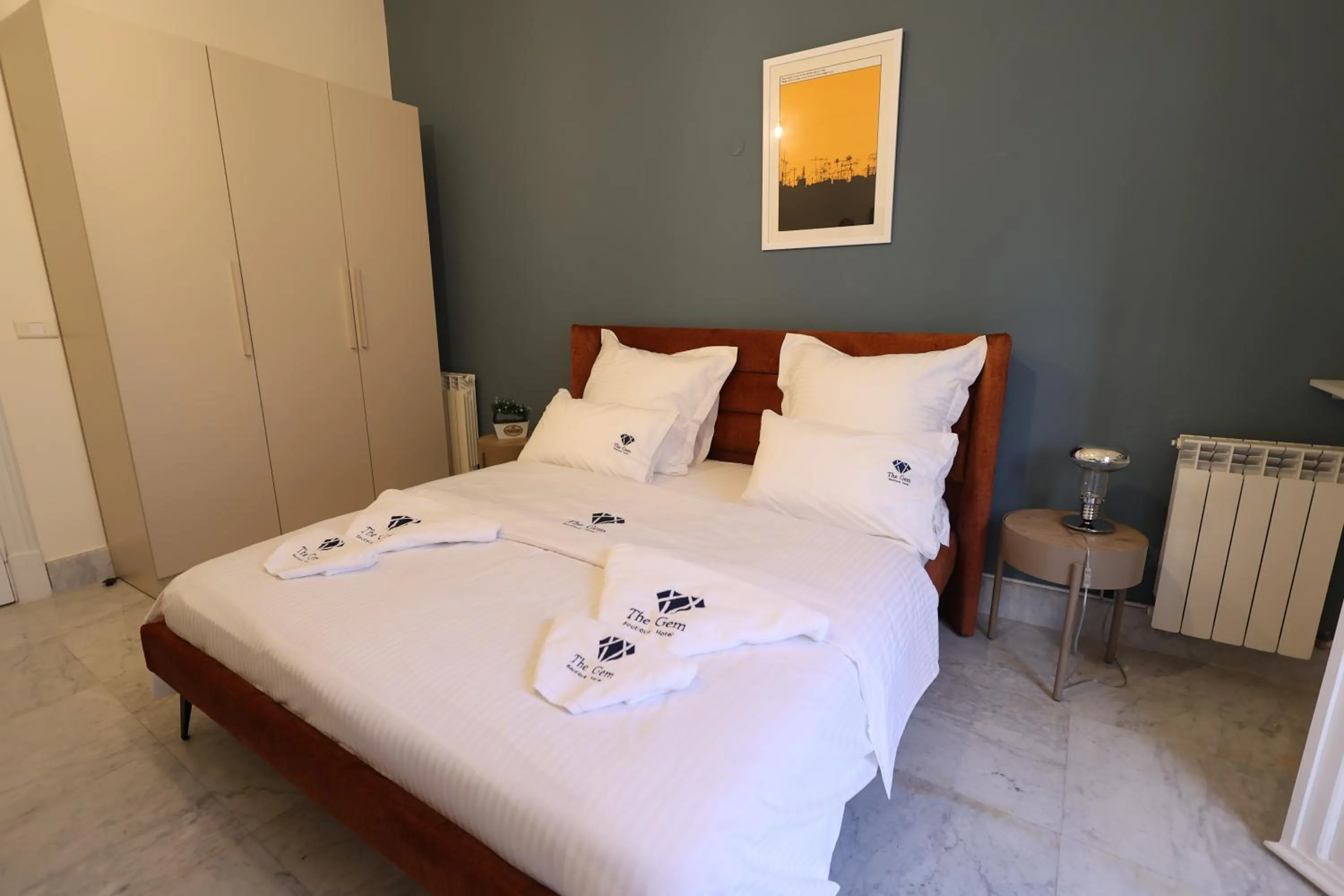 Bed in THE GEM BOUTIQUE HOTEL