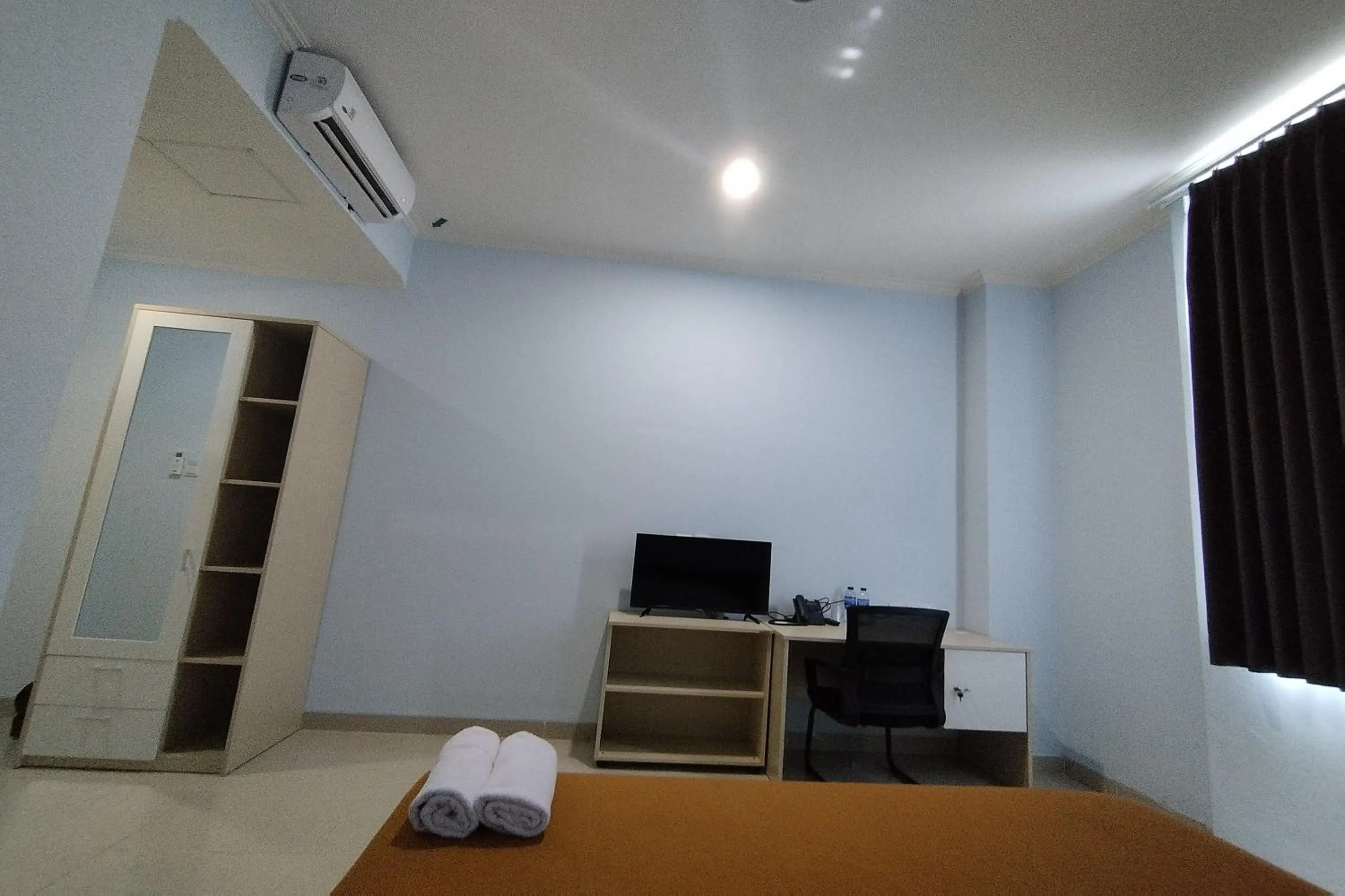 Bed in Hotel Sutha Inn Syariah