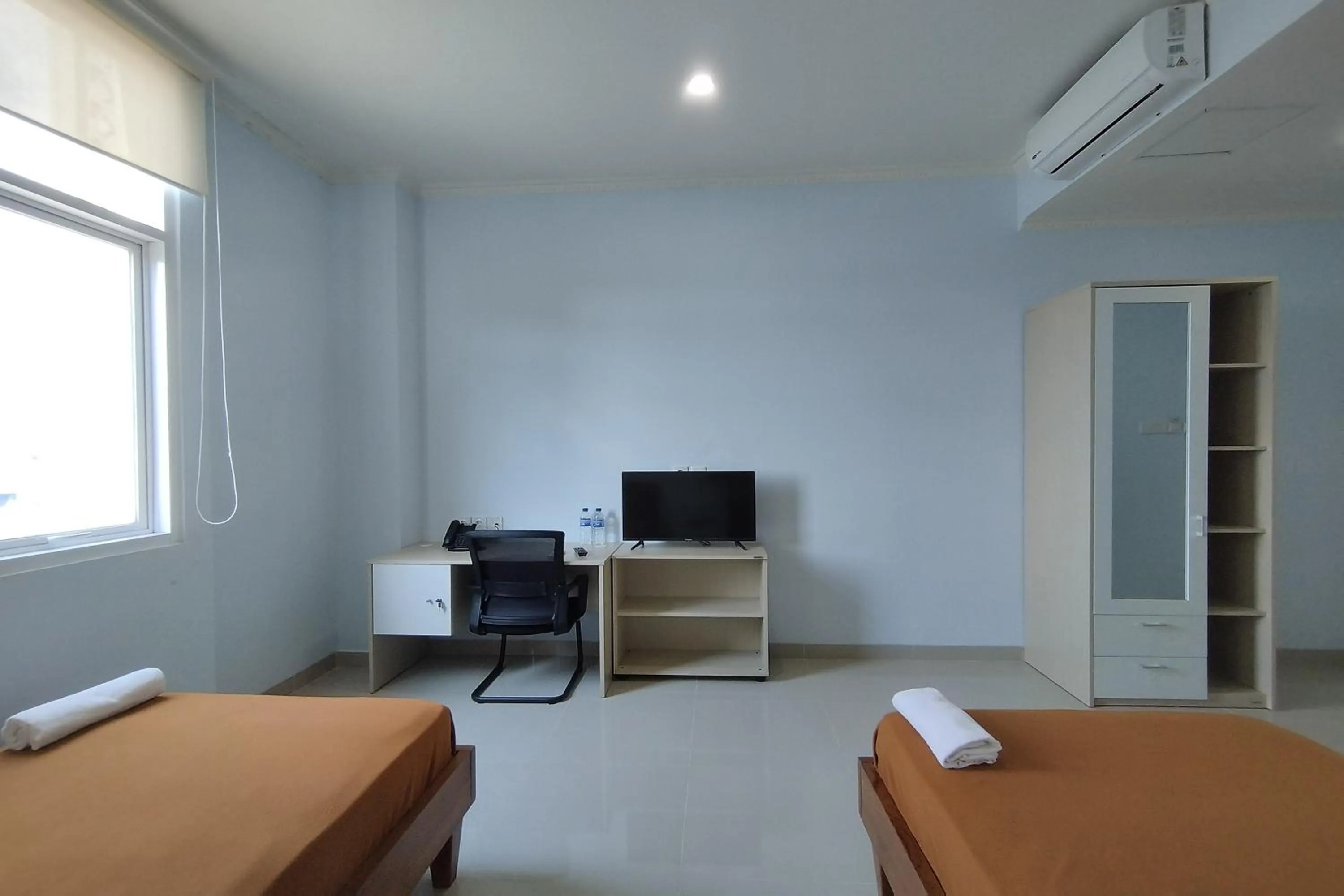 Bed in Hotel Sutha Inn Syariah