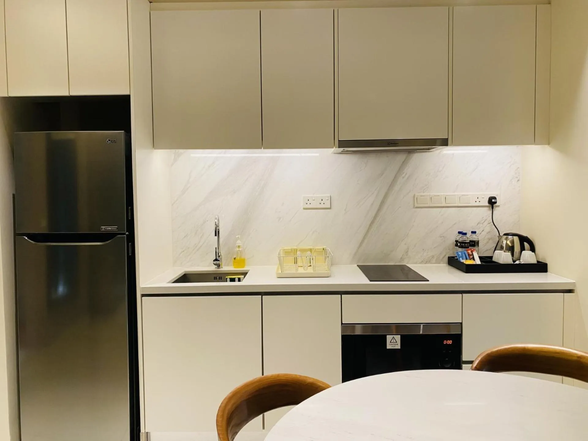 kitchen in Tribeca Serviced Hotel by Millennium