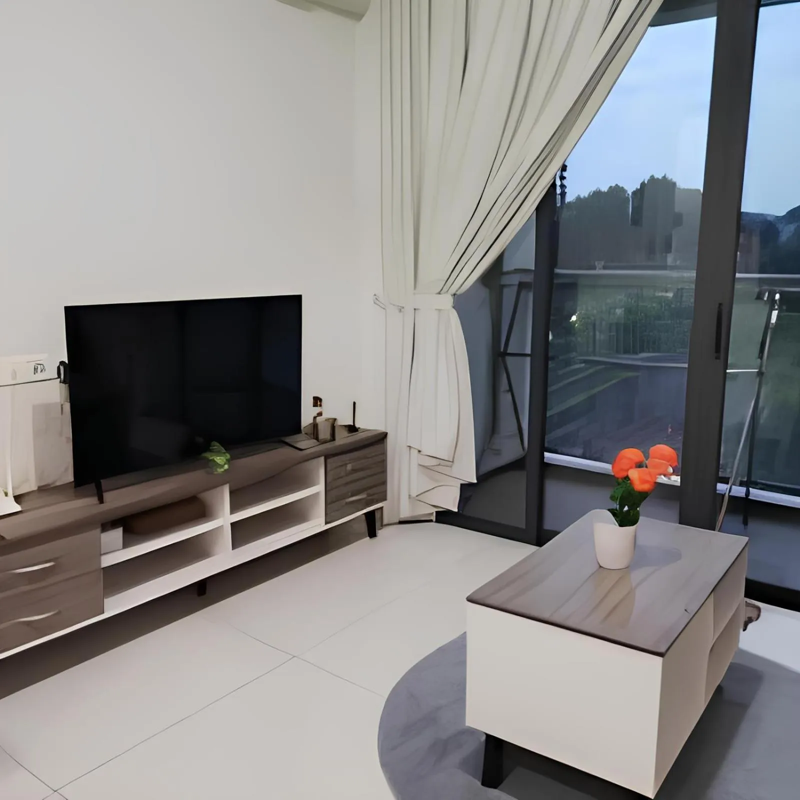 Living room in Cityview 2BR Country Garden Danga Bay - Natol