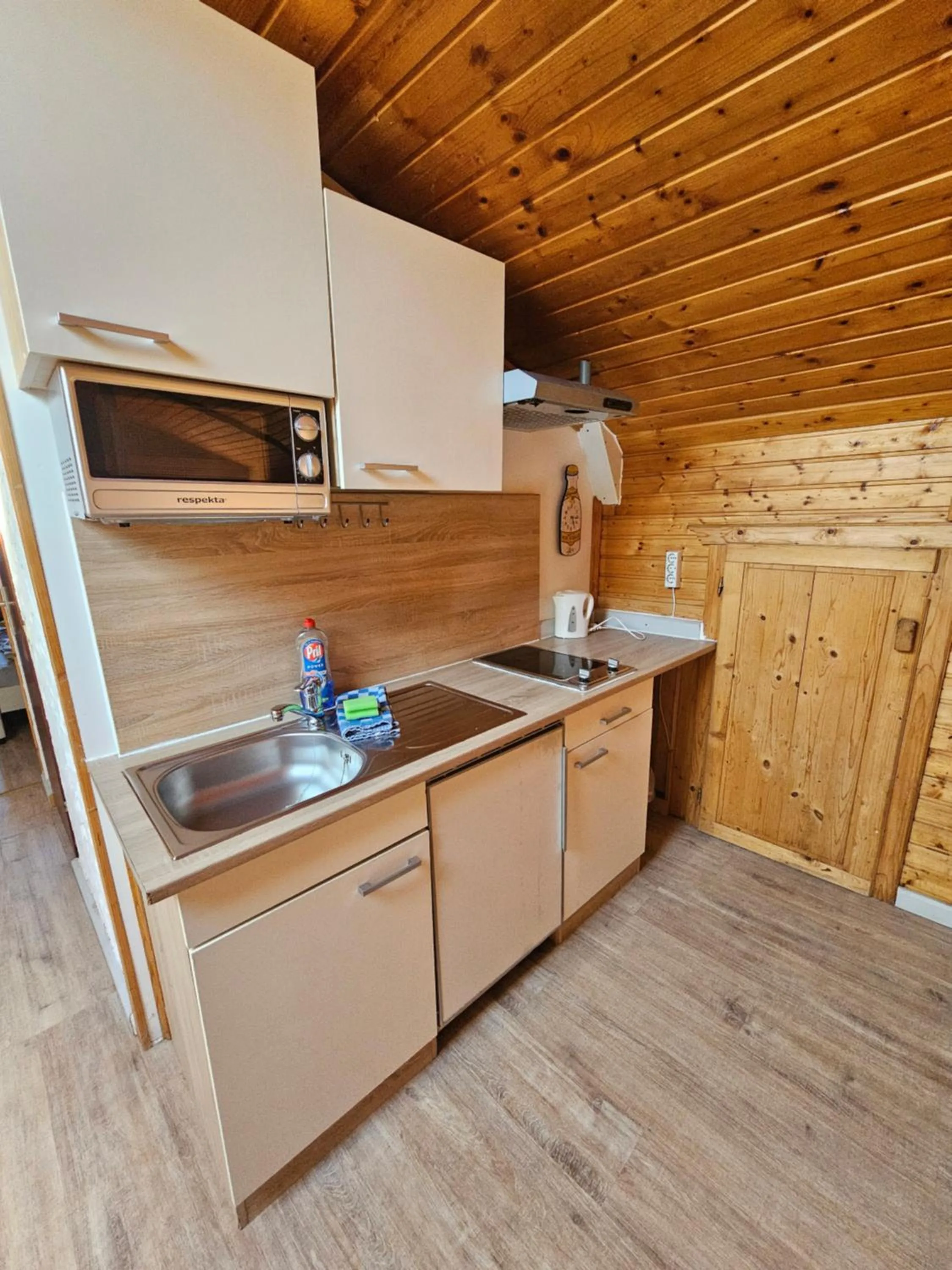 Kitchen or kitchenette in Karawanken Lodge