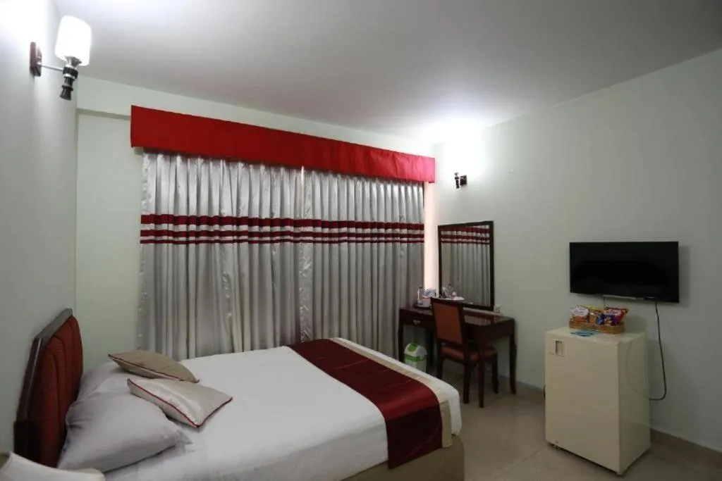 Bed in Meridian Hotel & Restaurant