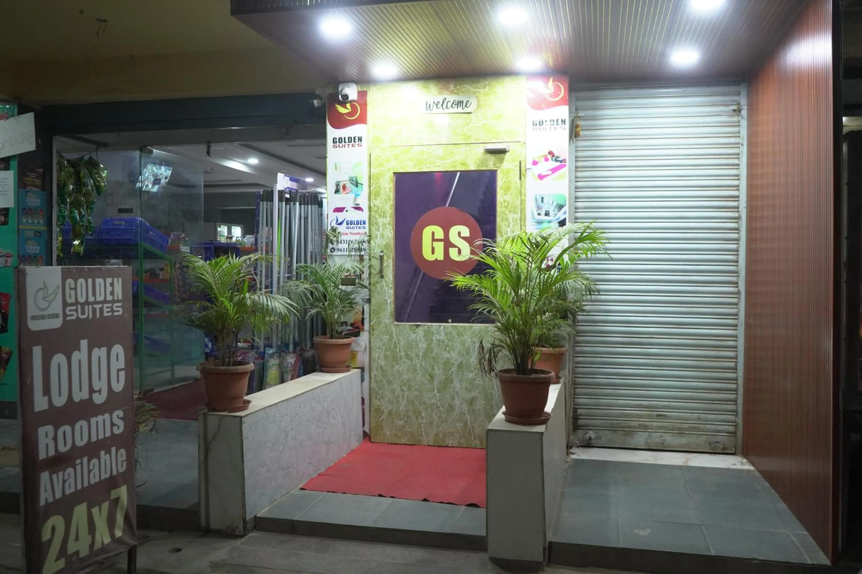 Property logo or sign in Hotel Golden Suites