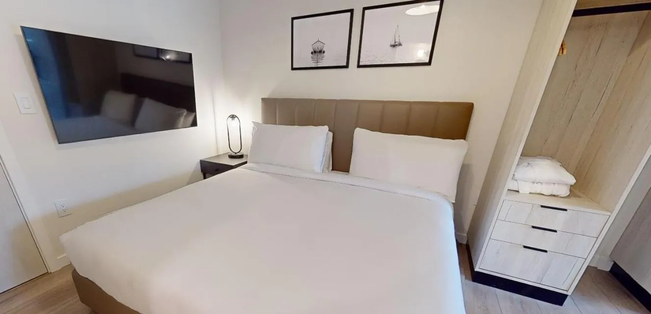 Bed in Steveston Waterfront Hotel