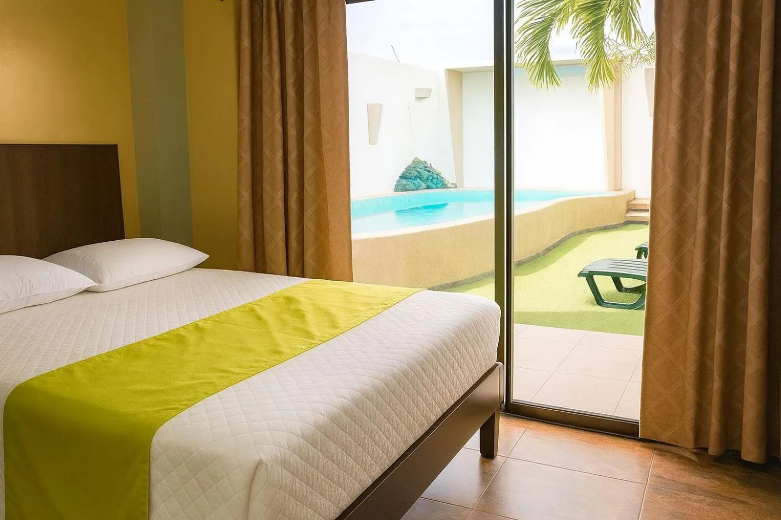 Pool view, Bed in HOTEL MANTA BEACH MADRIGAL