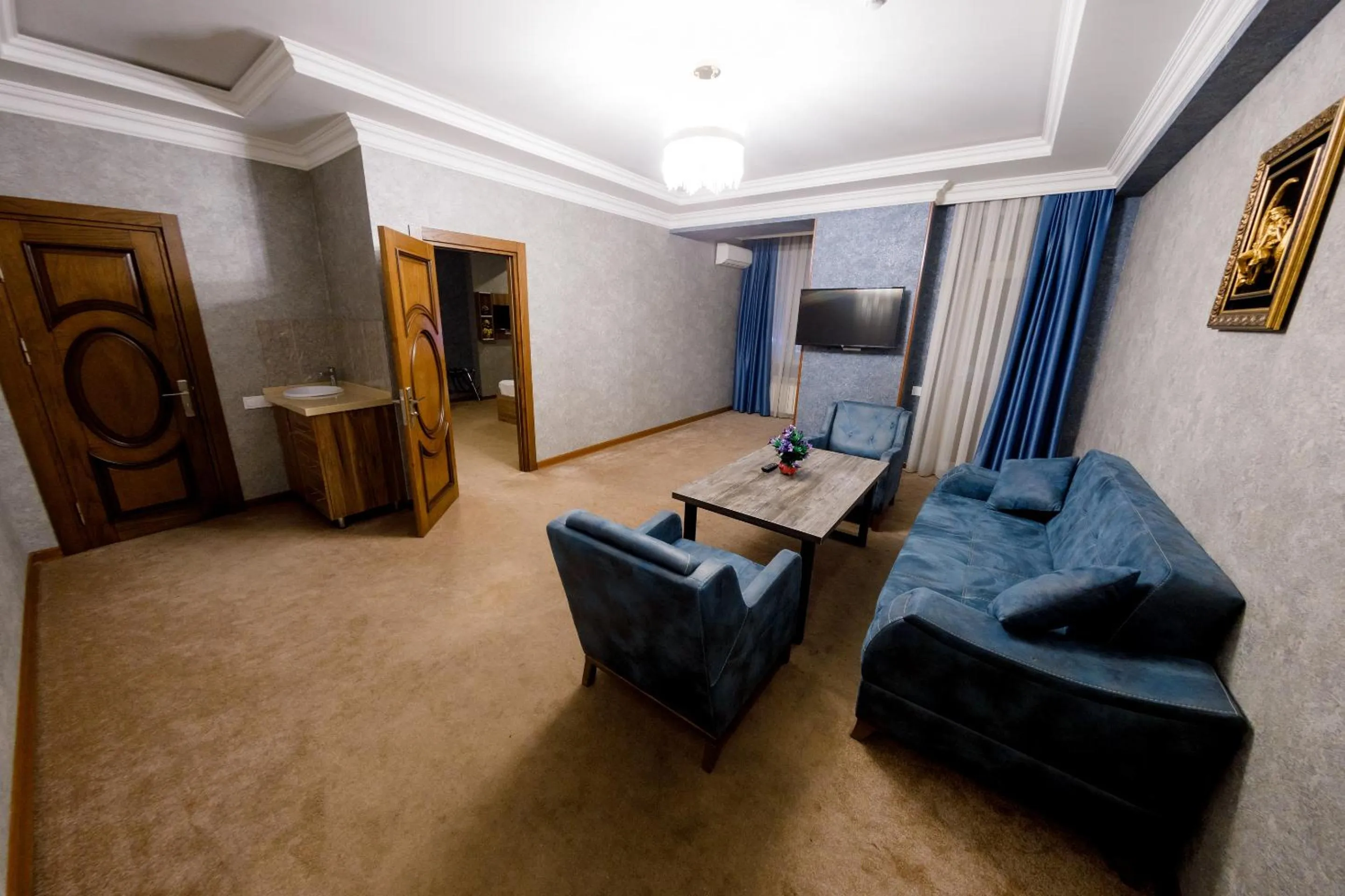 Communal lounge/ TV room in Royal Sapphire Baku