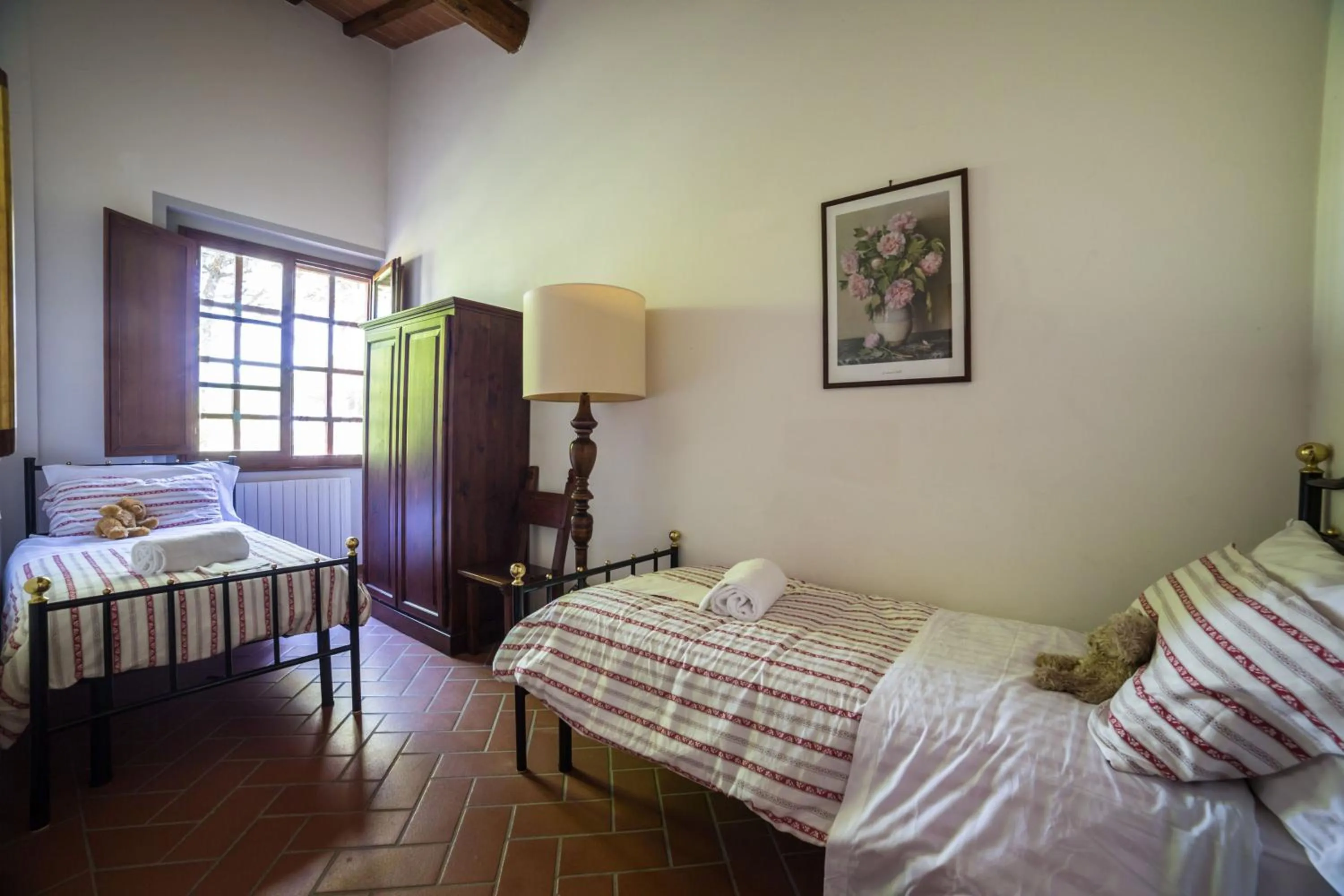 Bed in Fattoria Pagnana Suites & Pool