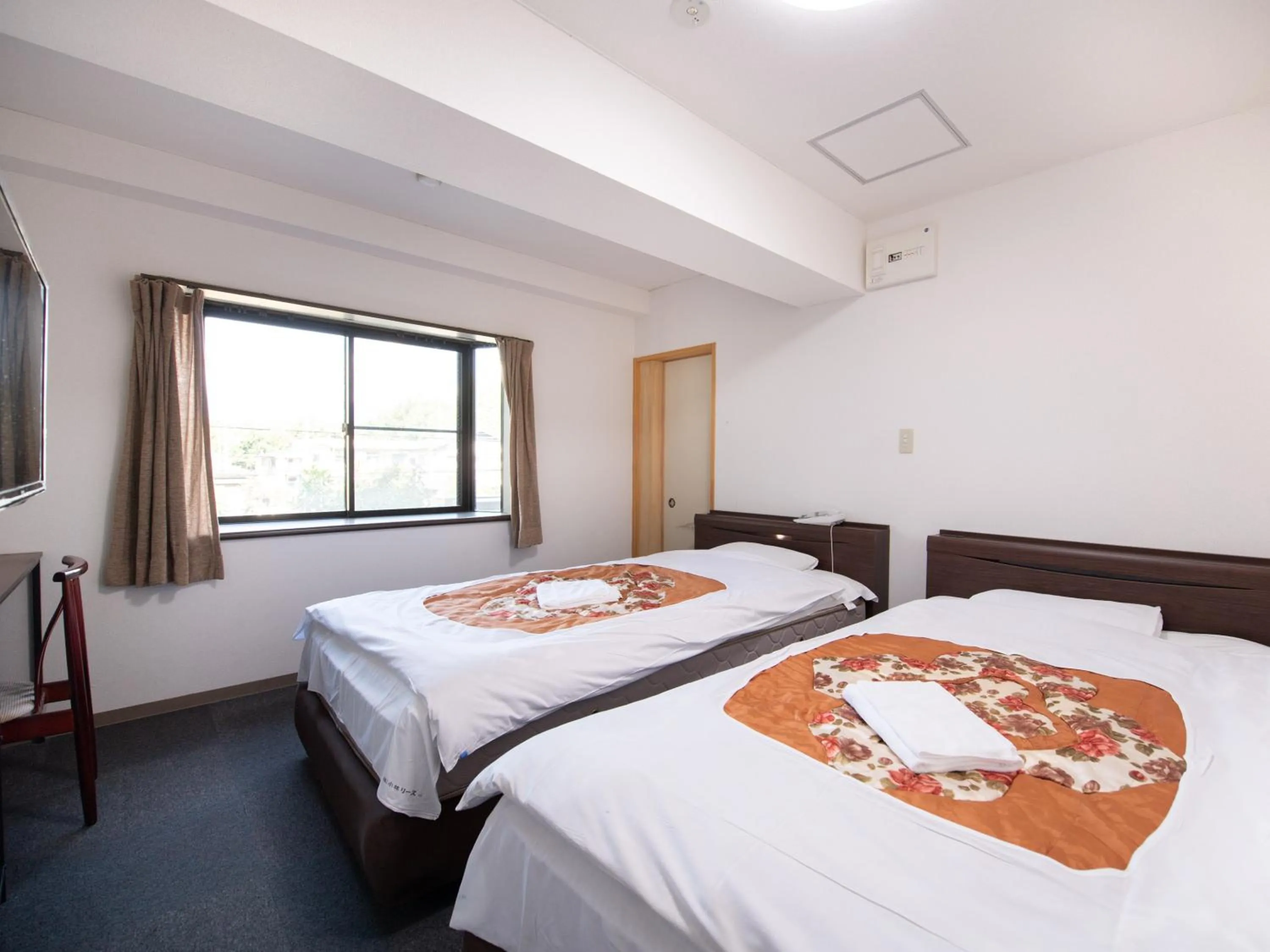 Photo of the whole room, Bed in Tabist Hotel Yamashiro Onsen