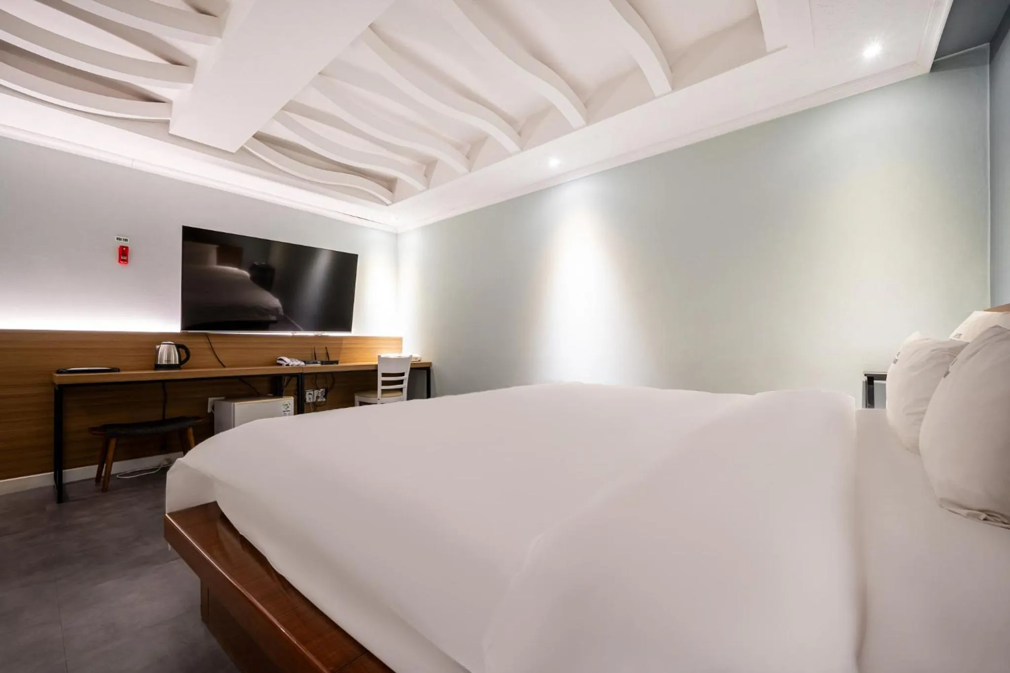 Bed in Hotel New Evergreen