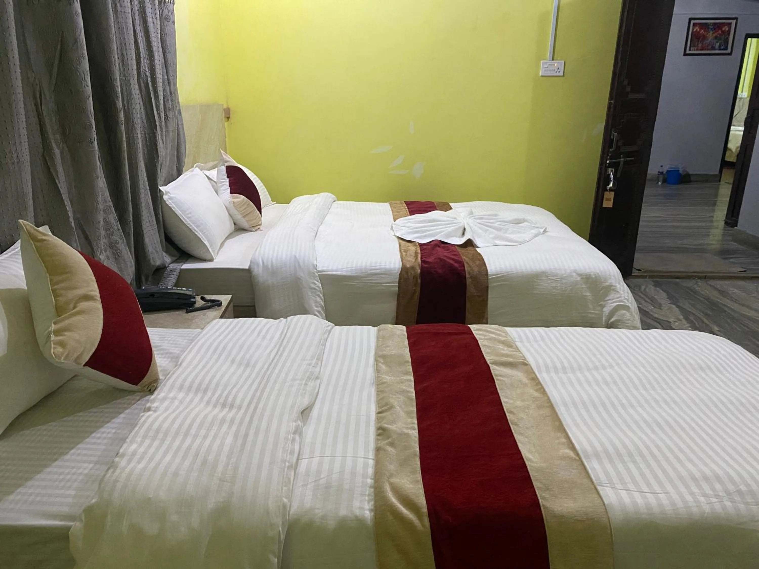 Bed in Hotel Kavya Inn