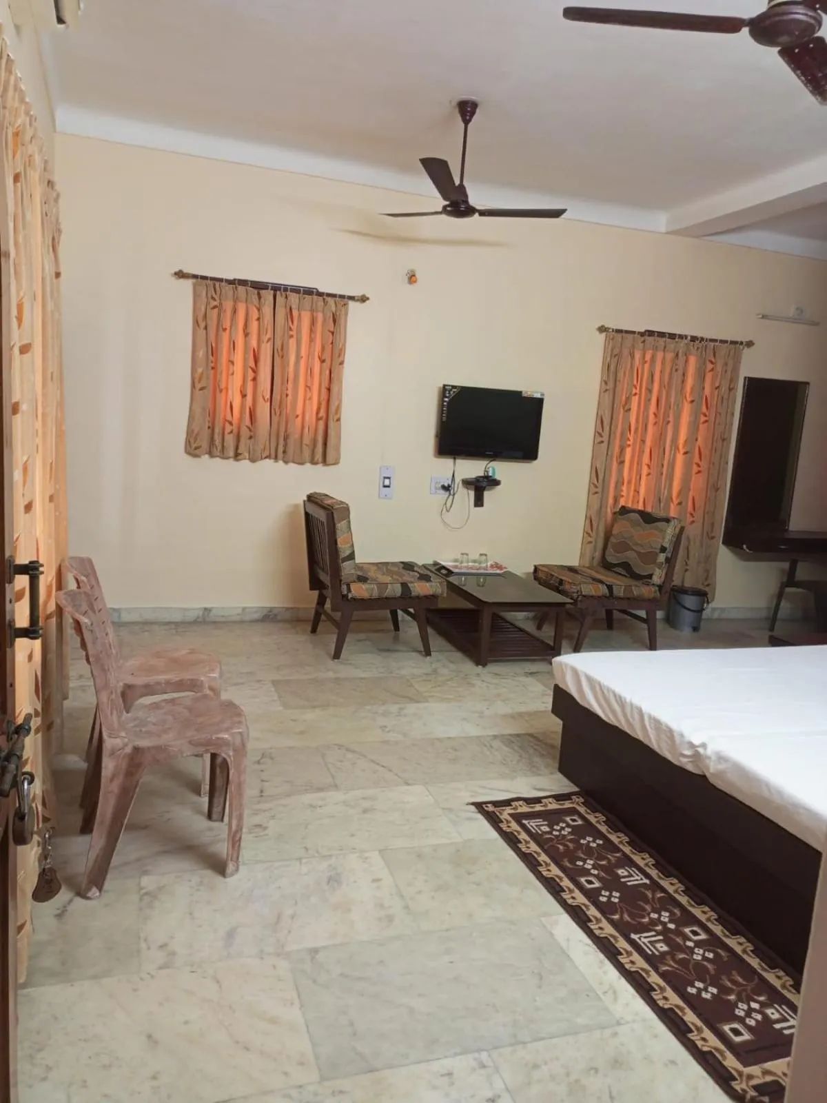 Living room, Bed in MADHUR RESIDENCY