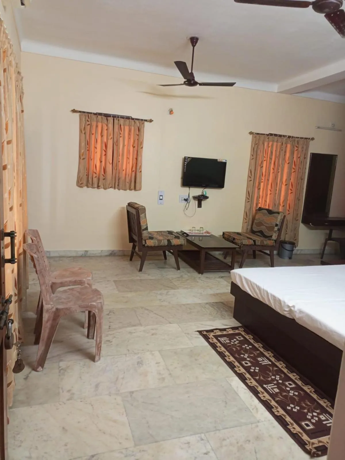 Living room, Bed in MADHUR RESIDENCY