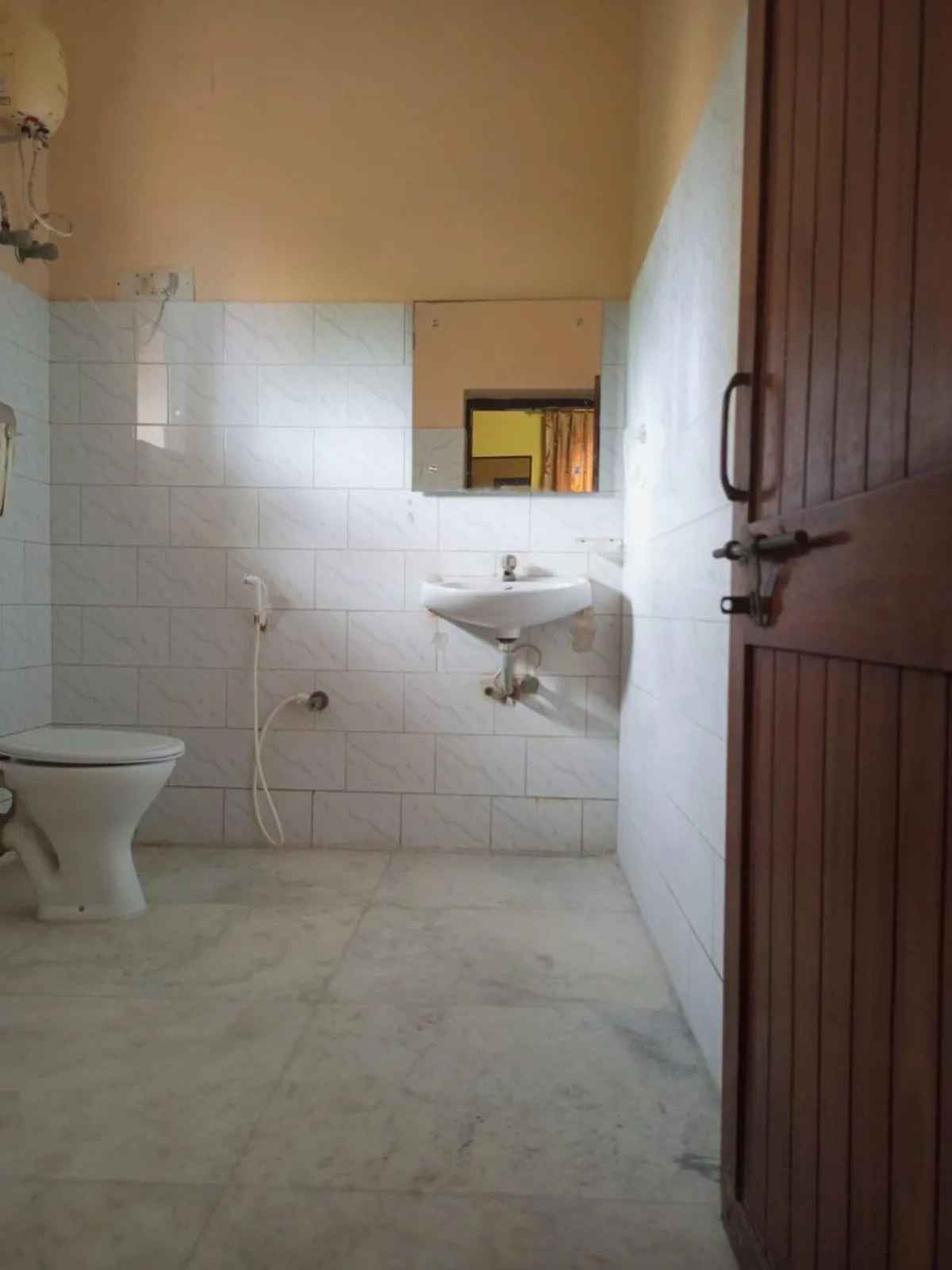 Toilet in MADHUR RESIDENCY