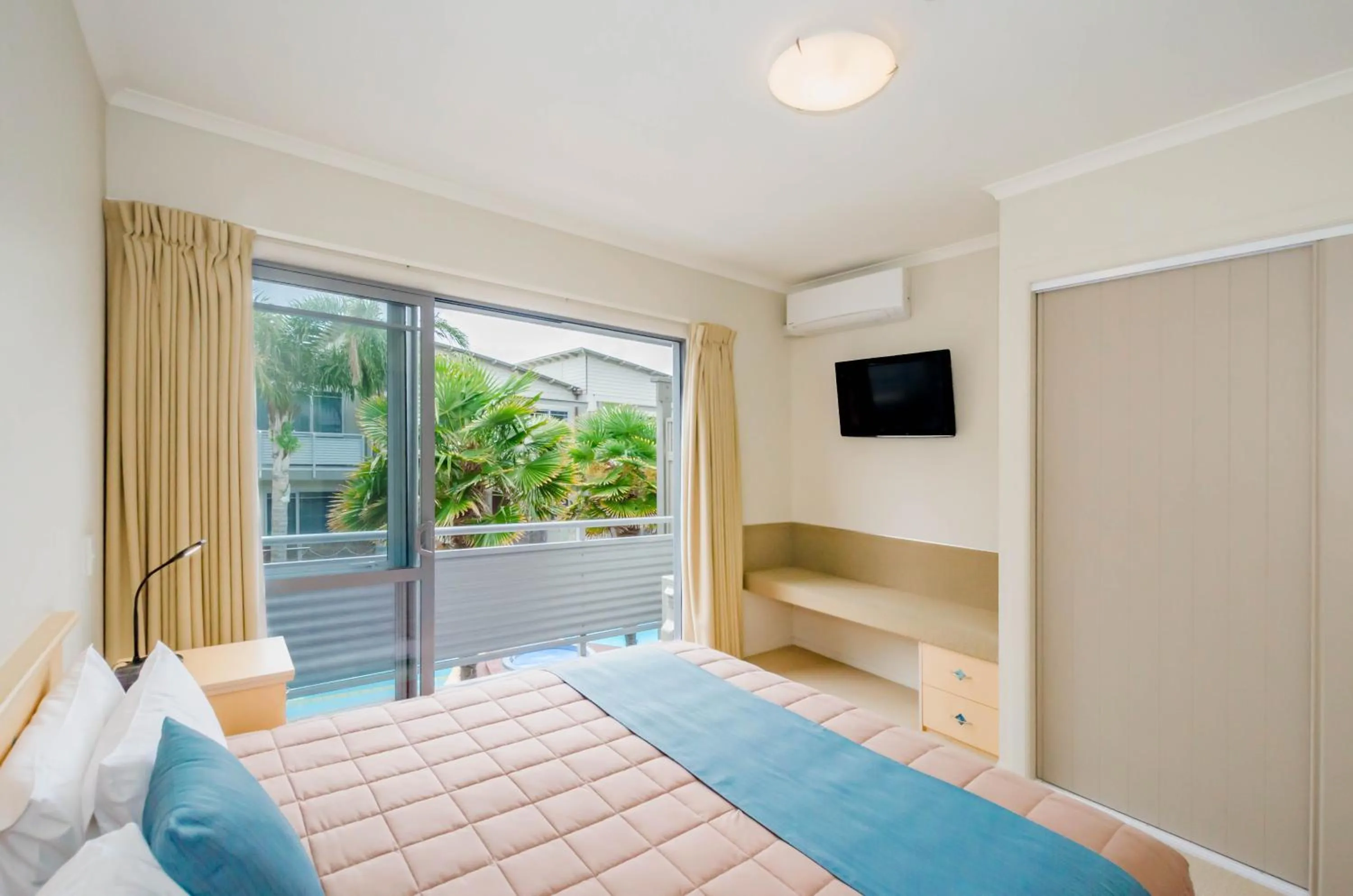 Bed in Raumati Sands Resort