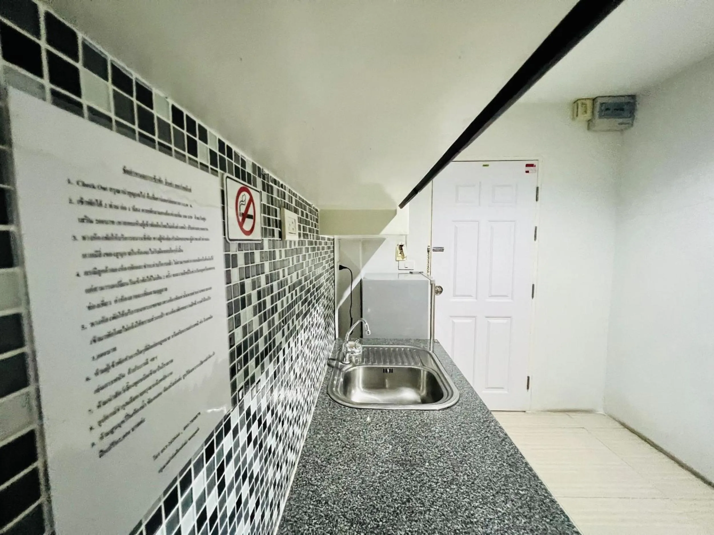 Kitchen or kitchenette in INN Kham Apartment