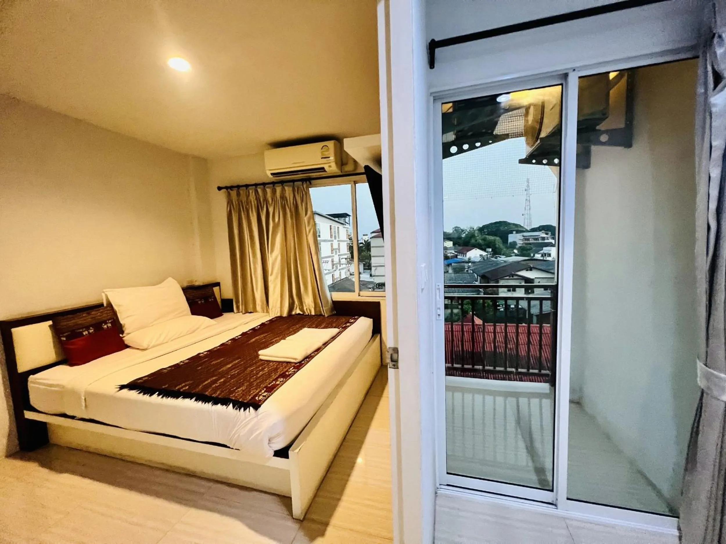 Bed in INN Kham Apartment