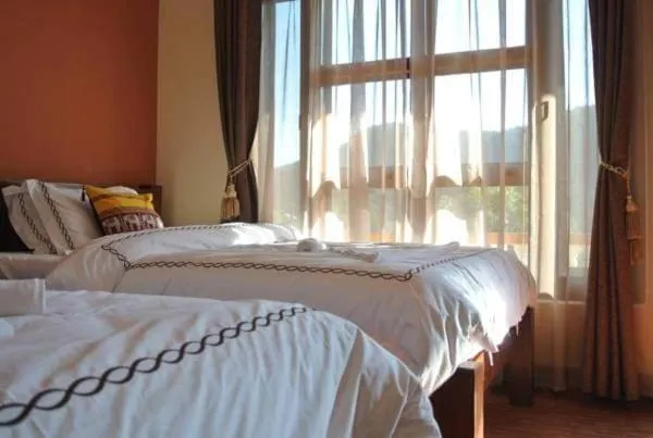 Bed in Hotel Tourist Residency