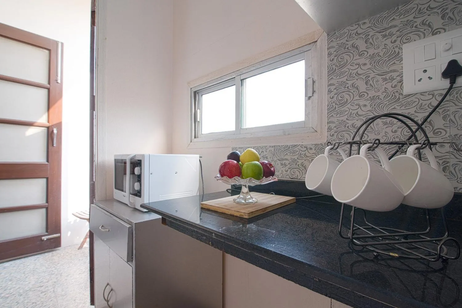 Kitchen or kitchenette in Perch Arbor Suites