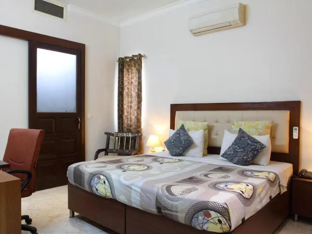 Bed in Perch Arbor Suites